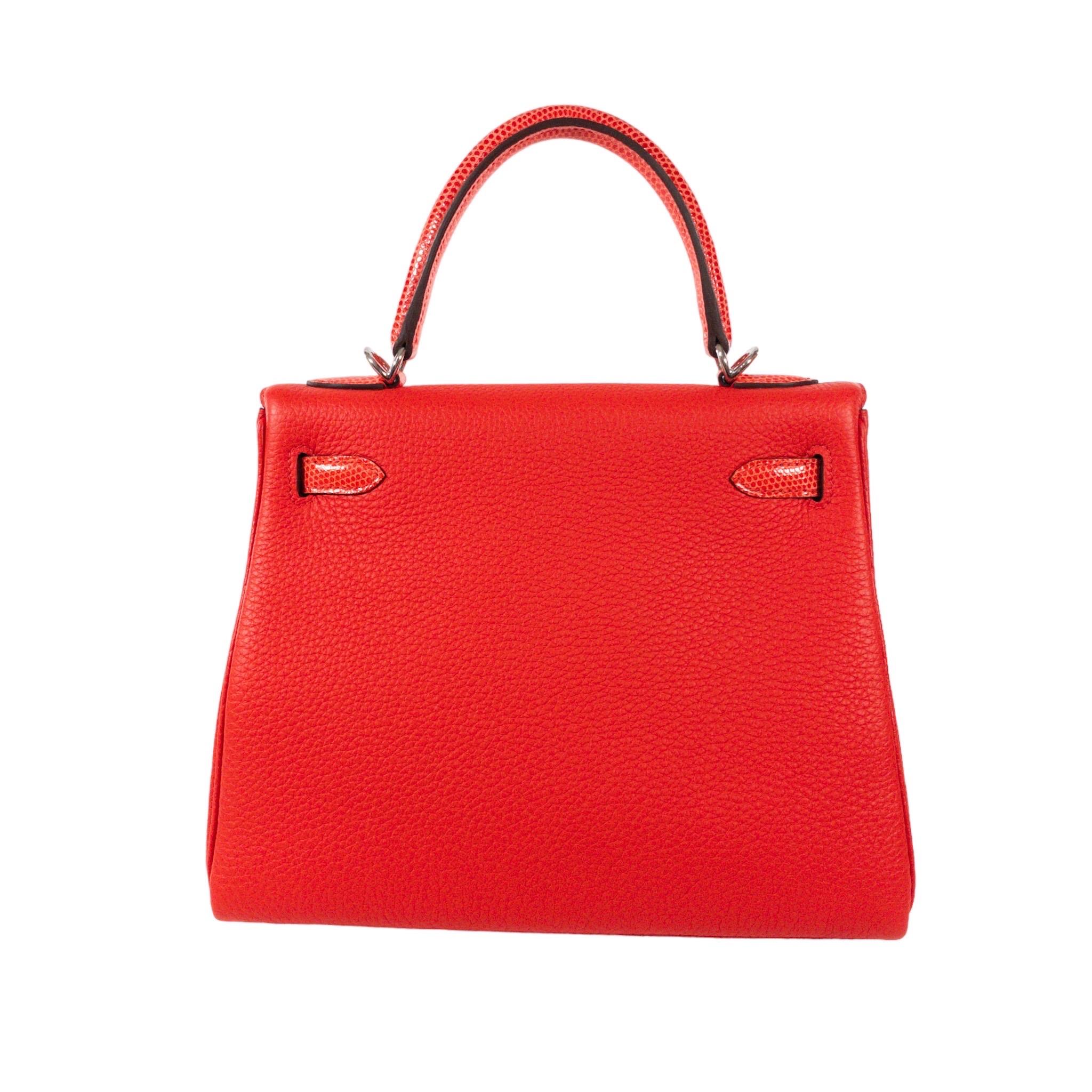 Consign of the Times presents this Limited Edition Hermes Kelly 25cm Retourne Orange Poppy and Capucine Lizard Touch. Palladium hardware with detachable shoulder strap. Flap closure and opens with turn lock straps. Lizard trim on straps, handle,