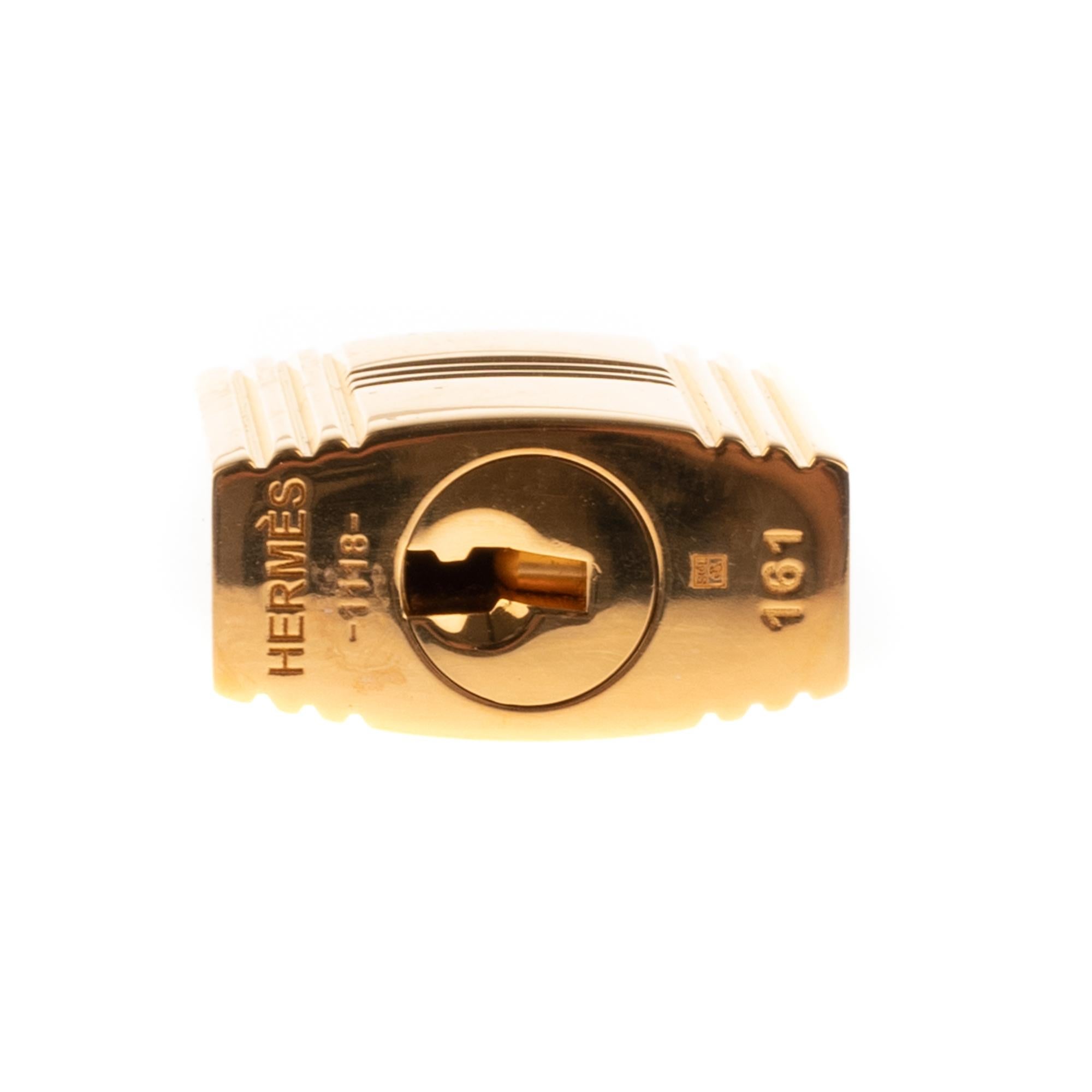 Brand New Hermès Padlock in gold plated metal for Birkin or Kelly handbags In New Condition For Sale In Paris, IDF