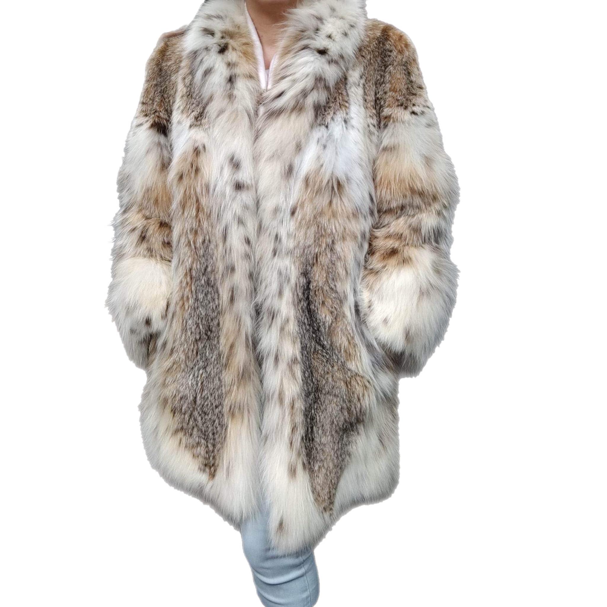 Brand new lightweight lynx fur coat size 12-14 In New Condition For Sale In Montreal, Quebec