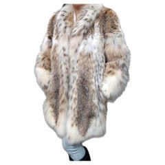 Manteau en fourrure de lynx léger, neuf, taille 12-14