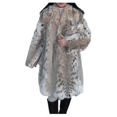 Nuovissimo cappotto di pelliccia di lince leggera taglia 14 L