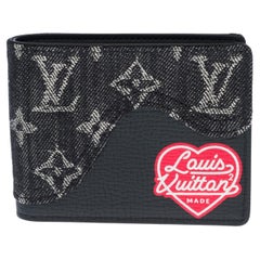 BRAND NEW- Limited edition Louis Vuitton Slender Wallet in black denim by Nigo