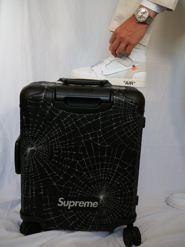 A PAIR OF LIMITED EDITION RED ALUMINUM SUITCASES, RIMOWA X SUPREME