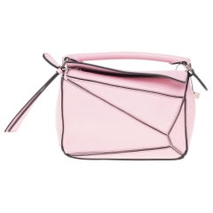 Used Brand New - LOEWE Mini Puzzle handbag with strap in pink calfskin