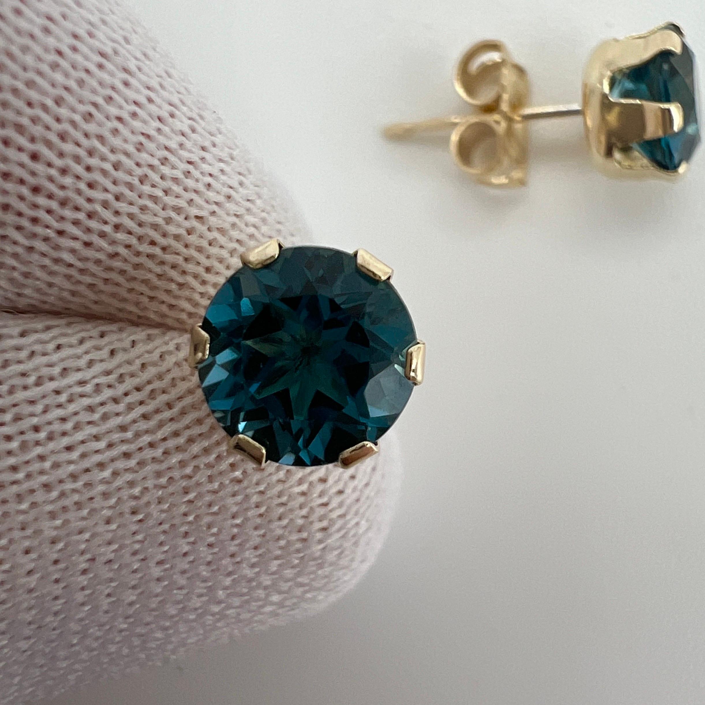 Natural London Blue Topaz 2 Carat Yellow Gold Earring Studs.

Beautiful 6mm matching pair of round topaz with vivid London blue colour, excellent clarity and an excellent round brilliant cut.

Set in lightweight 9k yellow gold suds with butterfly