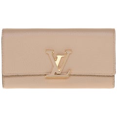 Brand New Louis Vuitton Capucines GM Wallet in beige Taurillon leather 