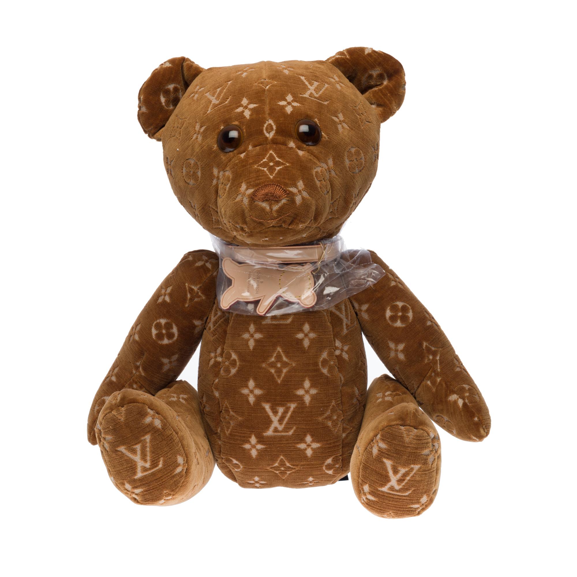 First seen on the Runway in 2004, the Teddy Bear DouDou is the only Teddy Bear created by Louis Vuitton in its 150 year history! With only 500 released worldwide this Teddy Bear is an adorable and rare item to own. It's crafted from soft beige and
