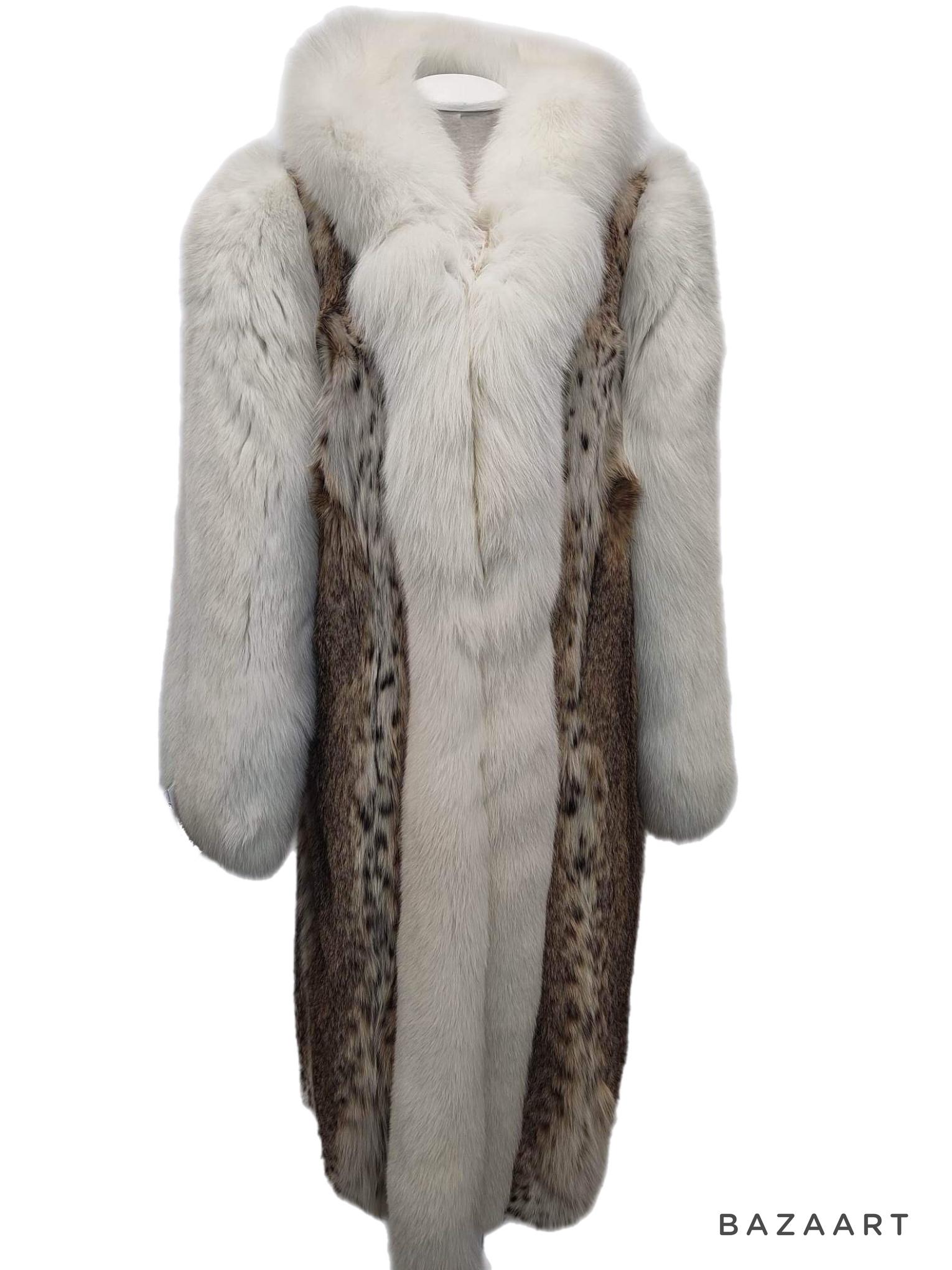 DESCRIPTION : Manteau de fourrure de lynx canadien neuf, taille 14 L

Col tailleur, manches droites, peaux souples, belle fourrure fraîche, fermoirs européens allemands pour la fermeture, deux poches fendues, belles grandes peaux pleines en état