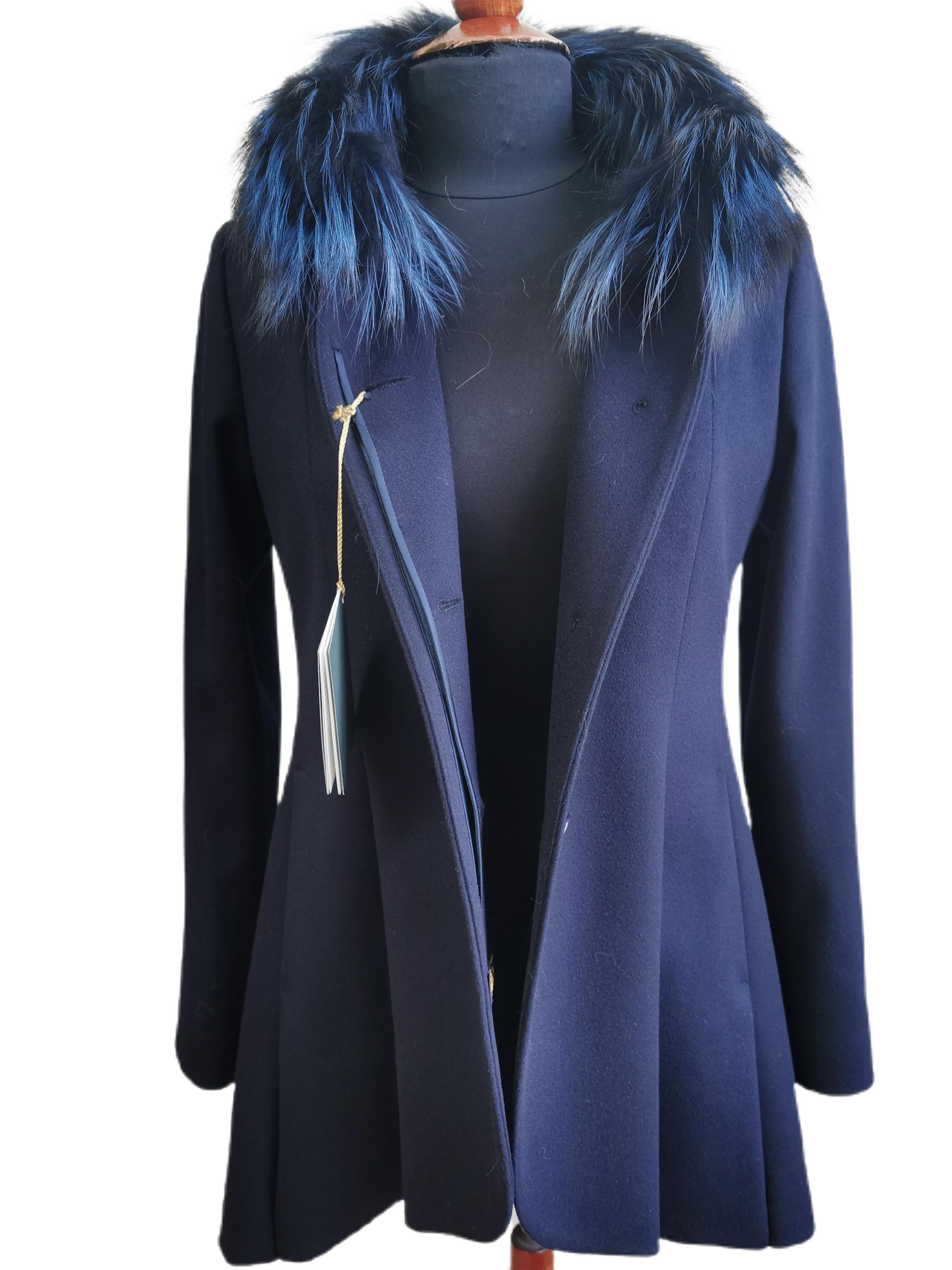 PRODUCT DESCRIPTION:

Brand new loro piana with fox fur trim 

Condition: Brand New

Closure: Buttons

Color: Navy blue

Material: Wool / Fox

Garment type: Coat

Sleeves: Bell

Pockets: two slit pockets

Collar: short

Lining: Shirred Silk