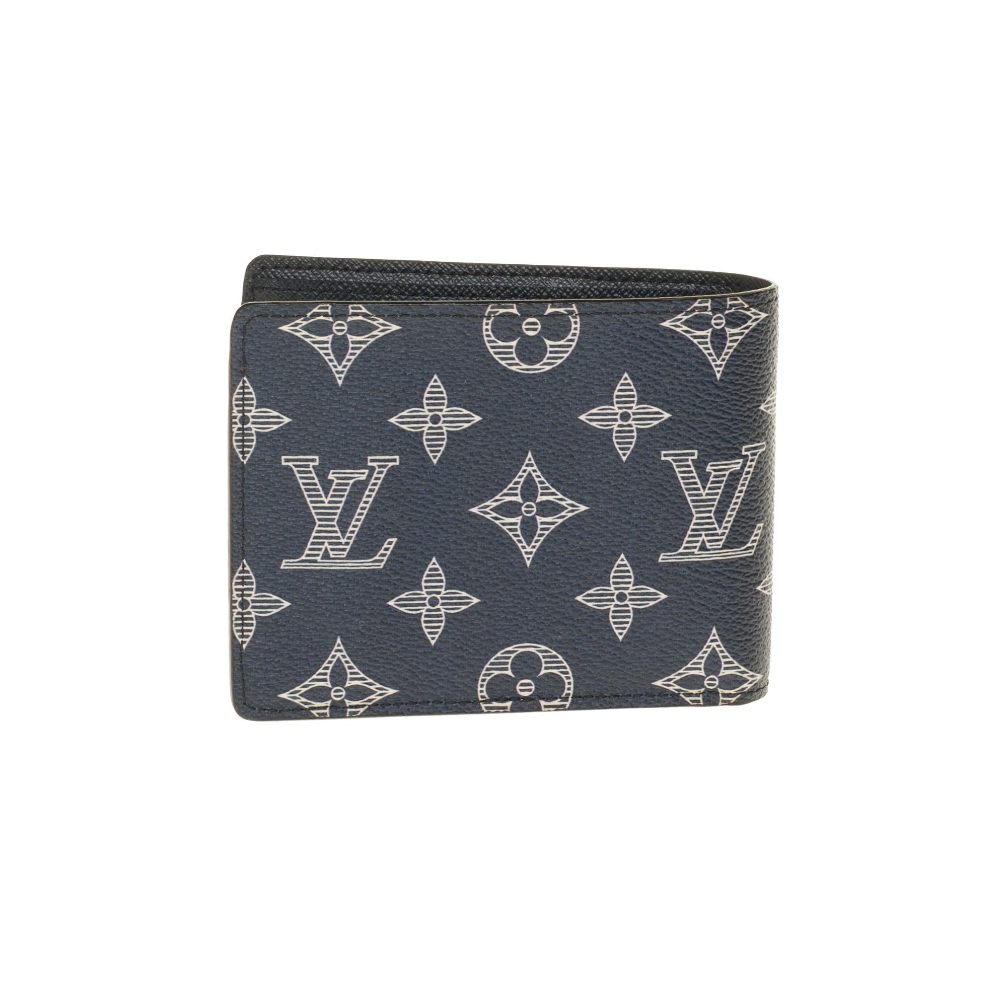 Rare collectible piece!

Louis Vuitton Chapman Brothers wallet in coated canvas with «zebra» pattern
Signature: Louis Vuitton, Made in France