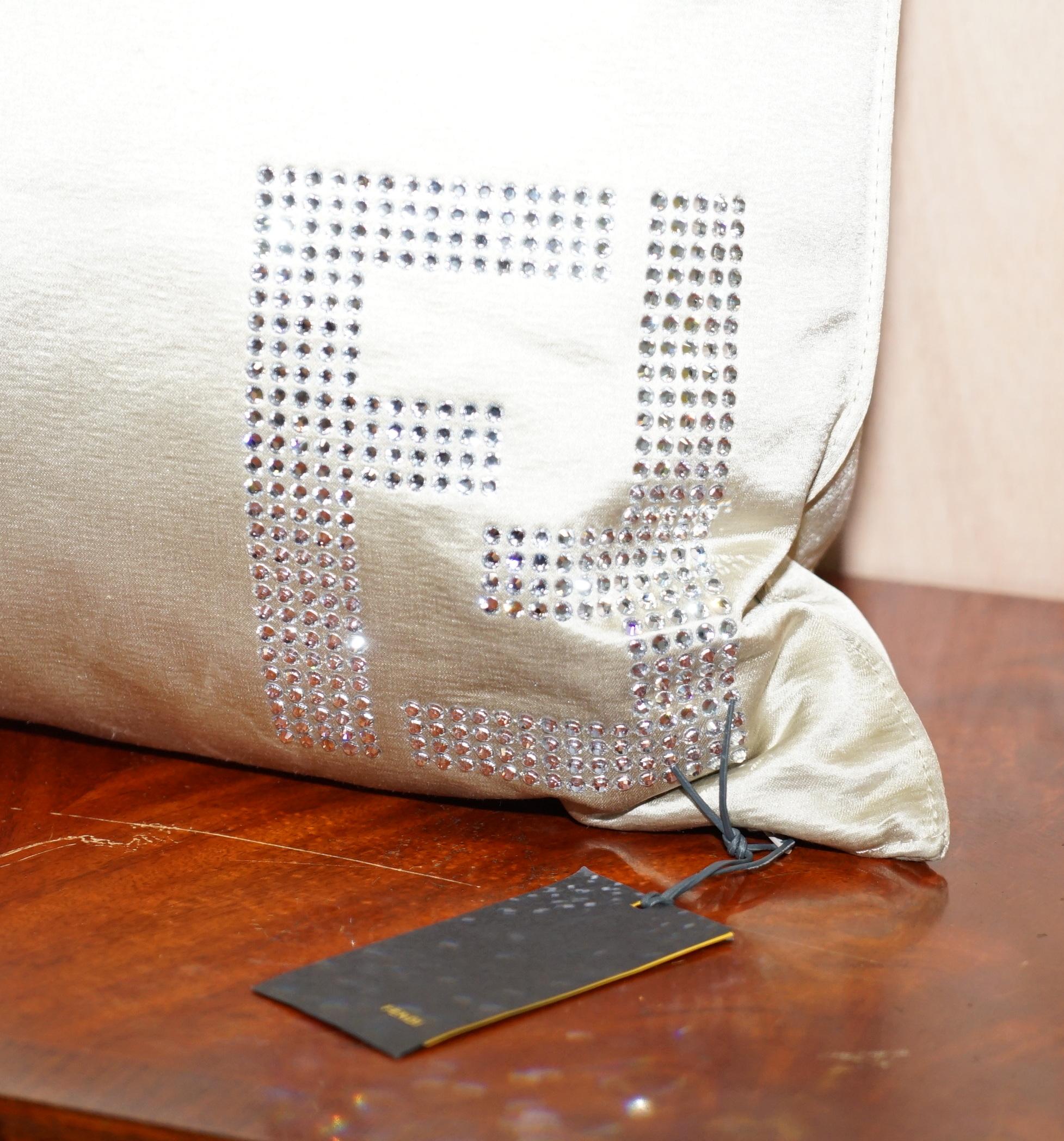 We are delighted to offer for sale this stunning brand new with tags Fendi Casa Italy scatter cushion with Swarovski crystal detailing

This cushion is part of a suite, they all came with one of two lovely Fendi sofas which are listed under my