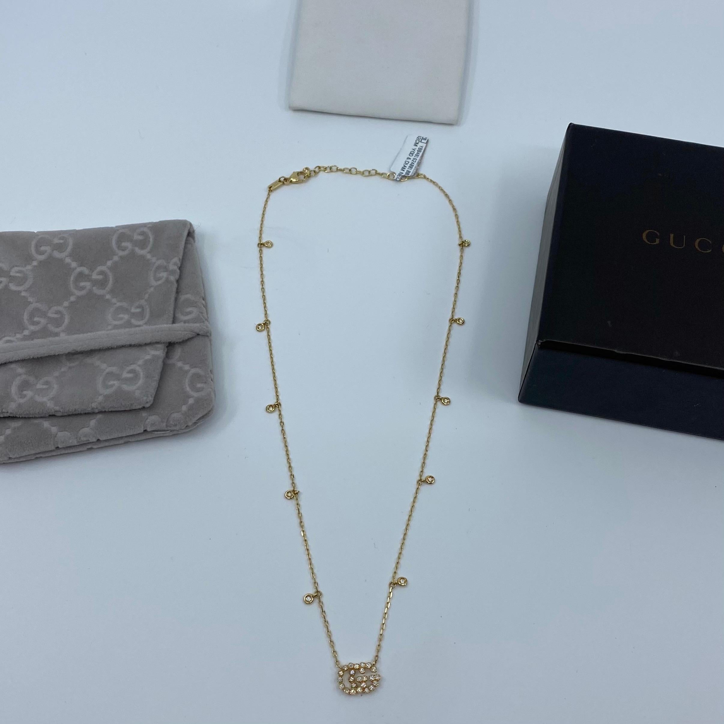 Gucci GG Logo Running Diamond Yellow Gold Pendant Necklace.

Fine Gucci necklace with diamond encrusted GG logo and diamonds running up the chain. 
Set in 18k yellow gold with Gucci hallmarks.

Adjustable length necklace. Can be worn between approx