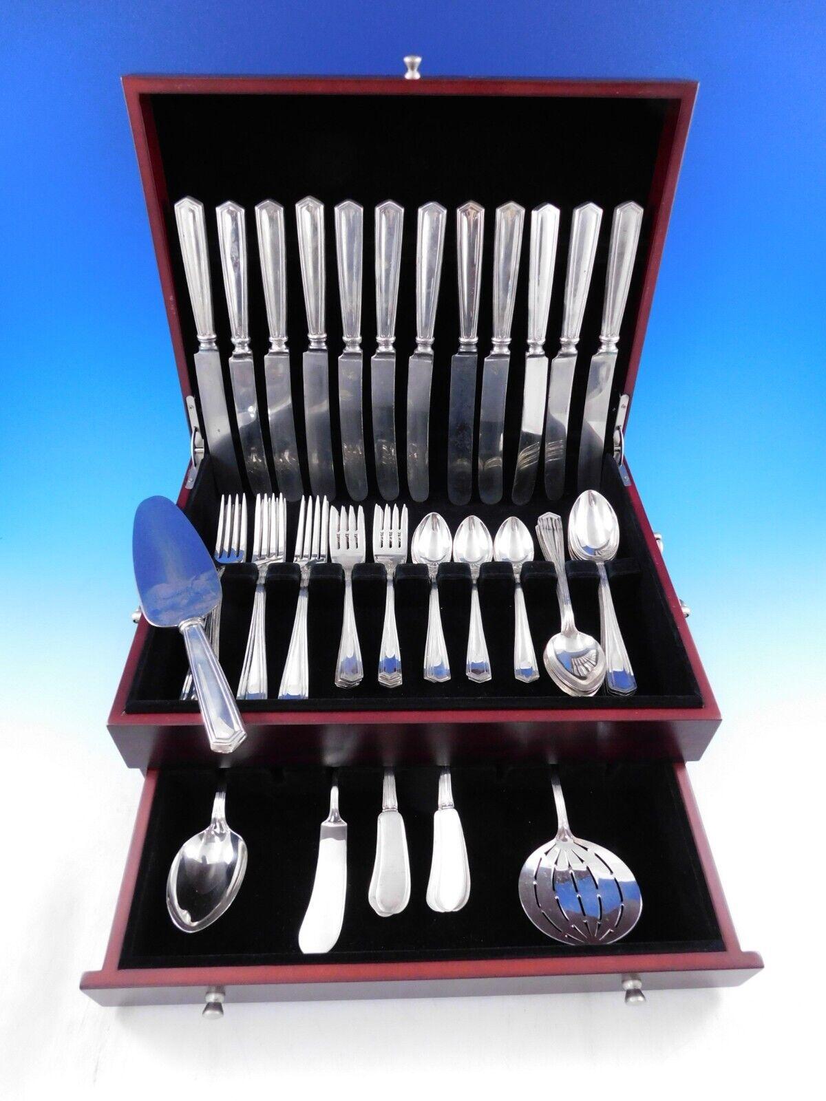 Dinner Size Bandon by International circa 1913 sterling silver Flatware set - 76 pieces, with timeless plain, simple, unadorned design. This set includes:

12 Large Dinner Size Knives, 10