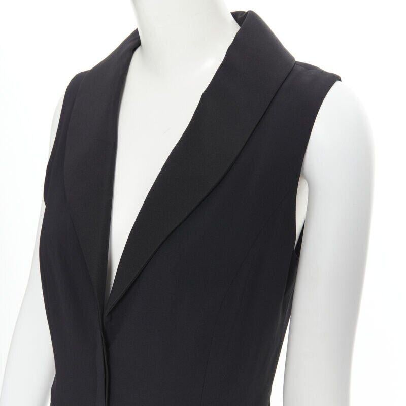 BRANDON MAXWELL black shawl collage plunge wide leg evening jumpsuit US2 XS
Reference: TGAS/B00681
Brand: Brandon Maxwell
Model: Jumpsuit
Collection: Spring Summer 2018
Material: Silk
Color: Black
Pattern: Solid
Closure: Zip
Lining:  Polyester
Extra