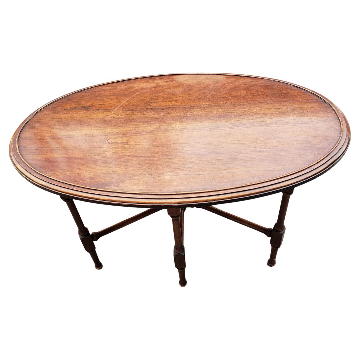 American Brandt Furniture Faux Bamboo Mahogany Oval Coffee Table, circa 1960s