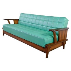 Brandt Ranch Oak Style Turquoise Vinyl Convertible Sofa Daybed by Economy Furn