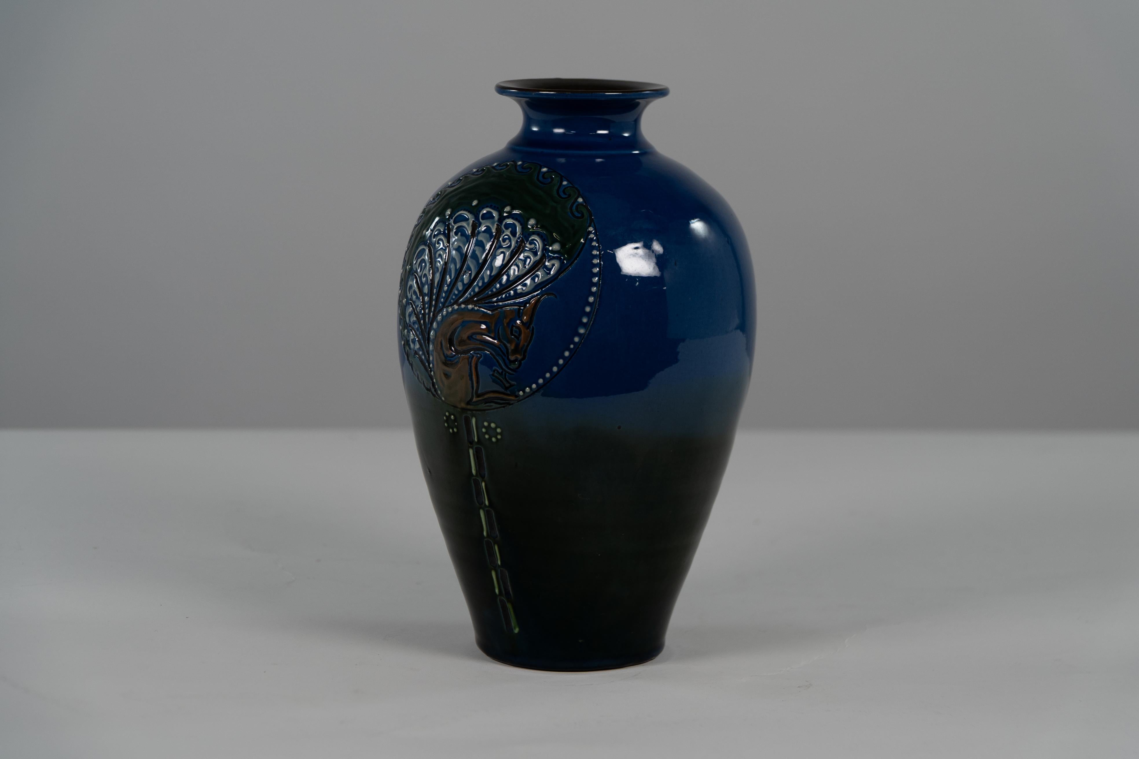 English Brannam of Barnstaple. A rare blue vase decorated with a squirrel eating nuts. For Sale