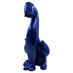 Brannan Barum ceramic sitting dog with blue glaze, 20th Century