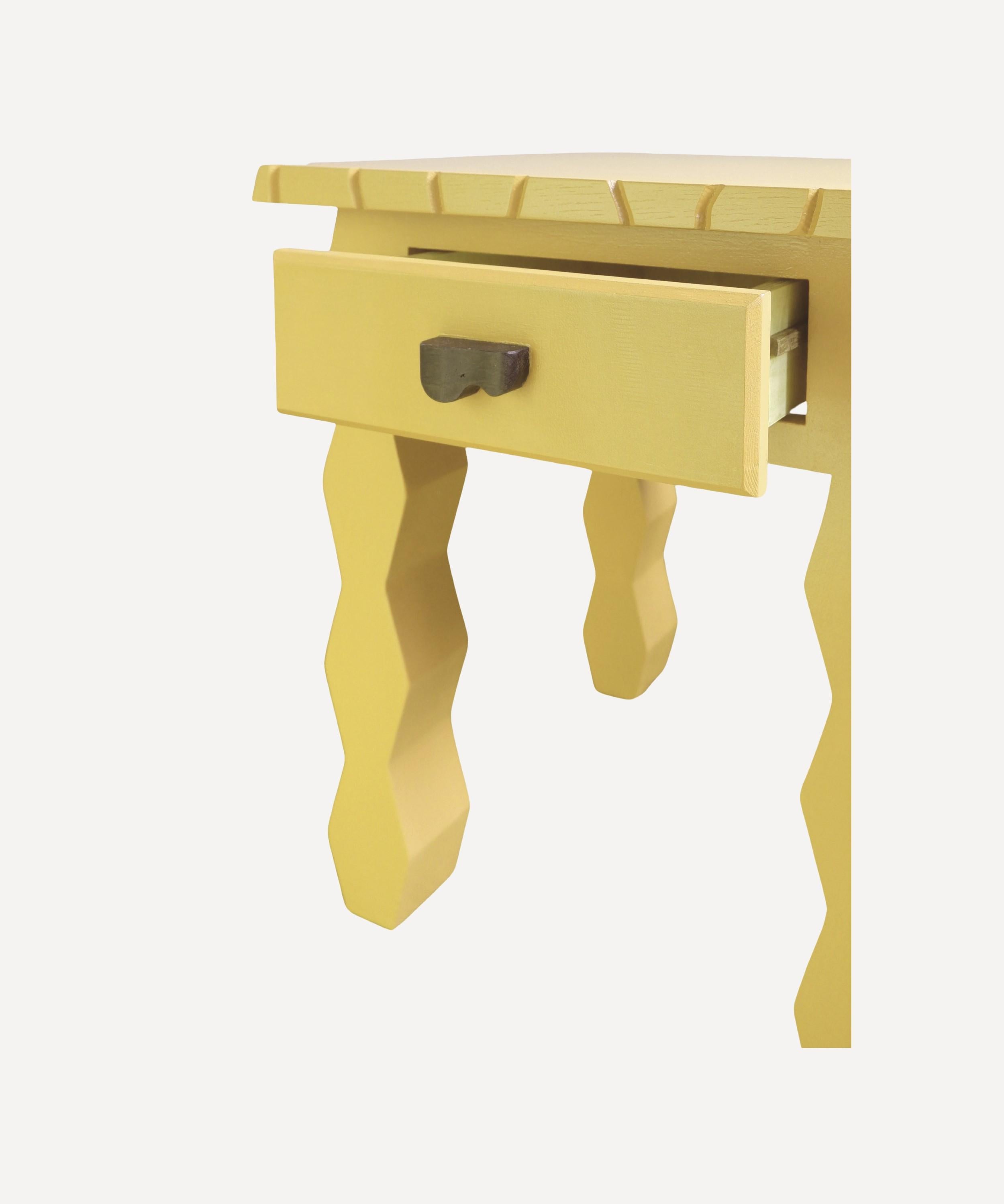 Part of the Cubist Collection, the Braque's Bedside Table is handcrafted from a tulipwood base, a birch plywood drawer and top and finished with a carved bog oak handle. 

A bold, statement piece finished in Farrow & Ball modern eggshell, Gervase