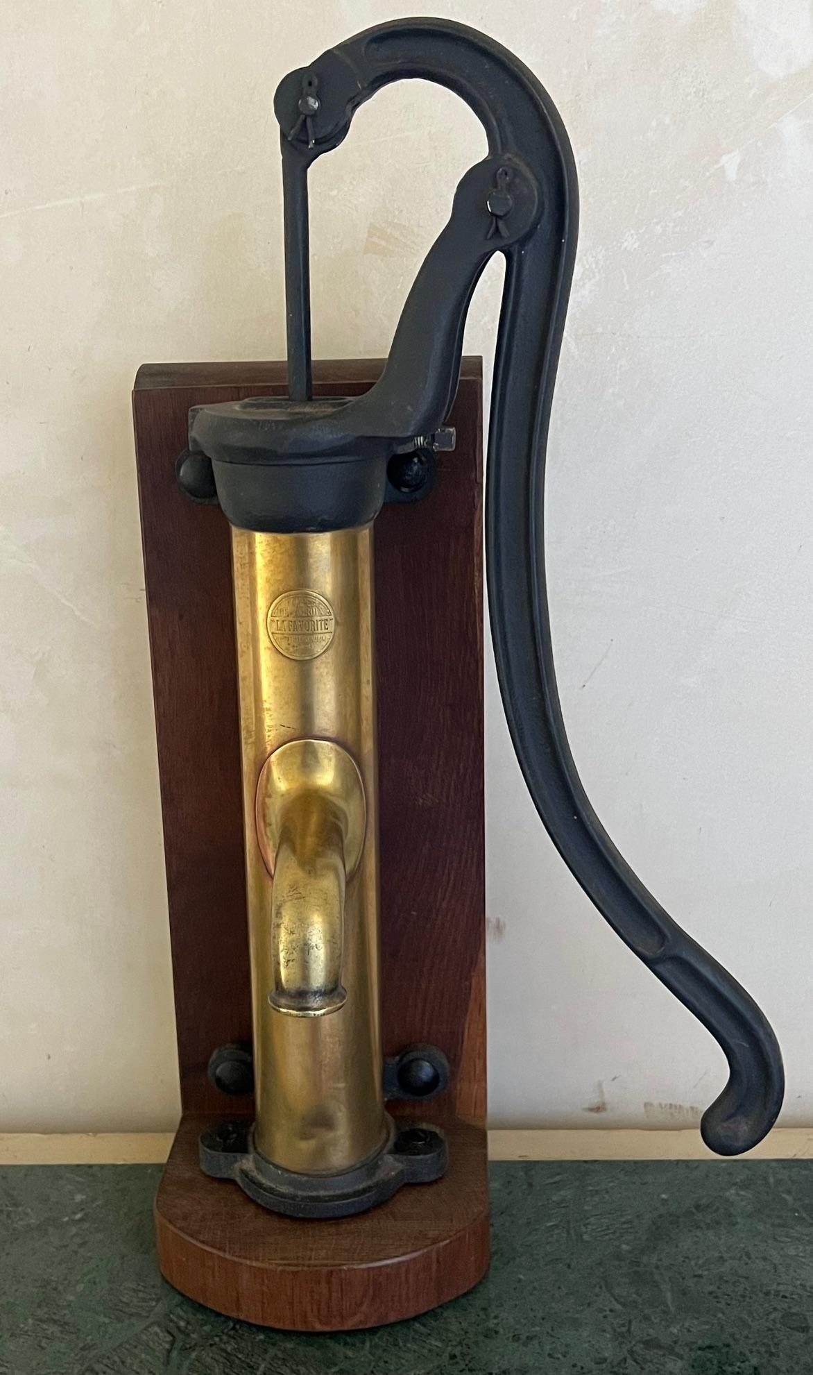 French Provincial Brass and Cast Iron Antique Pump and Spout Mounted on Wood, c. 1900 For Sale
