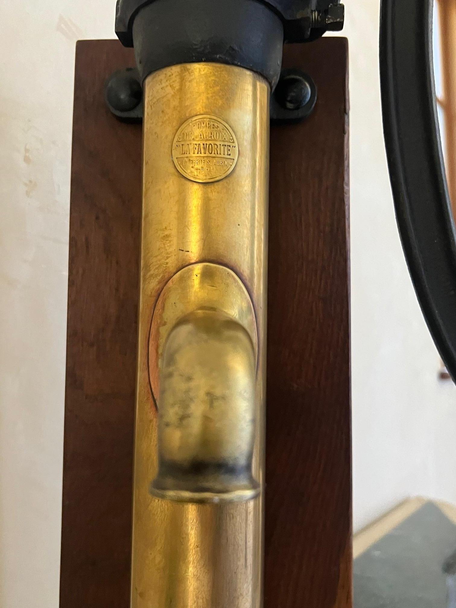 Brass and Cast Iron Antique Pump and Spout Mounted on Wood, c. 1900 For Sale 1