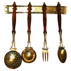 Antique Brass Old Kitchen Utensils with from a Hanging Bar, Early 20th Century