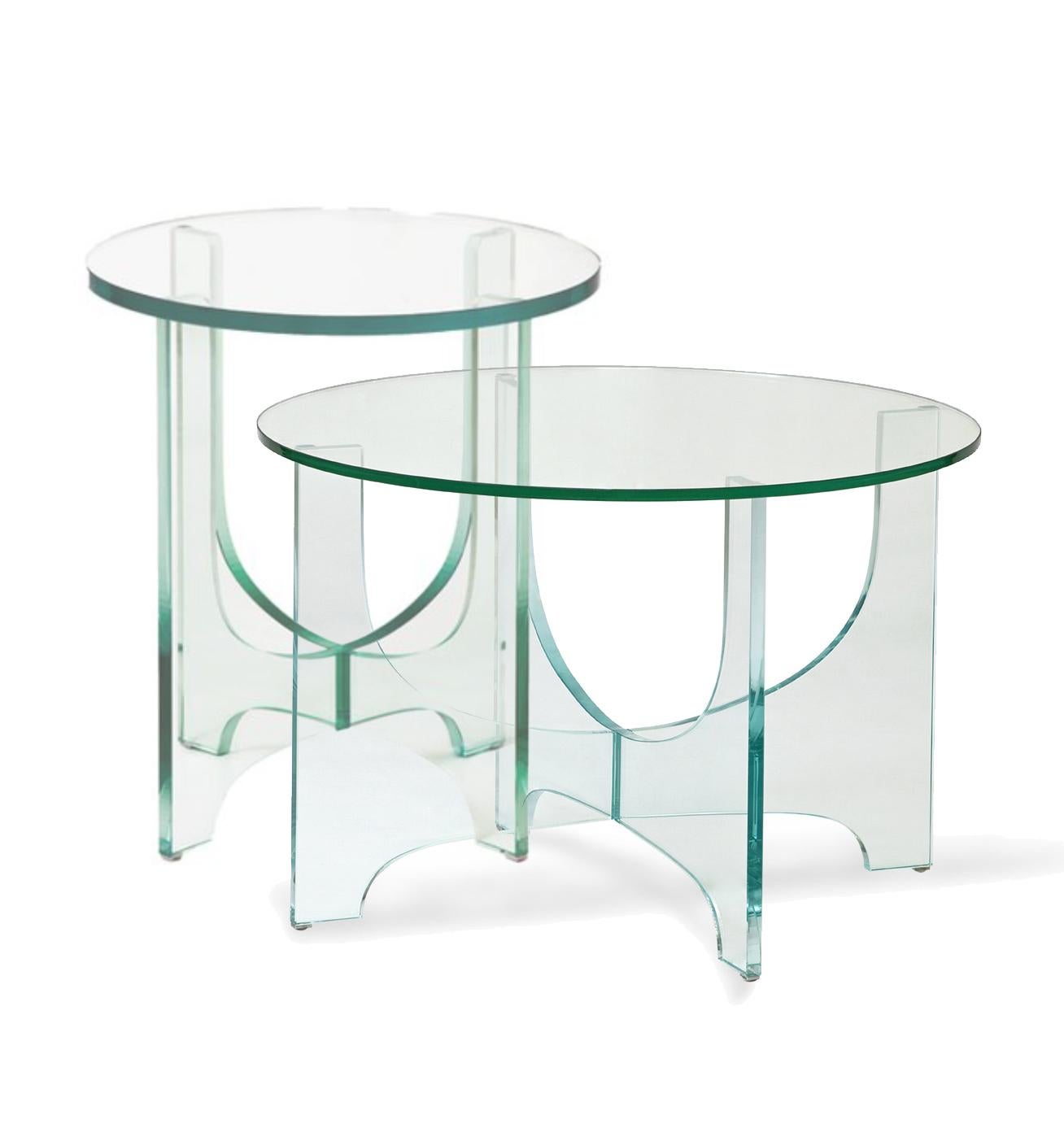Side table made entirely of glass.

Materials: 
15mm thick clear glass.
  