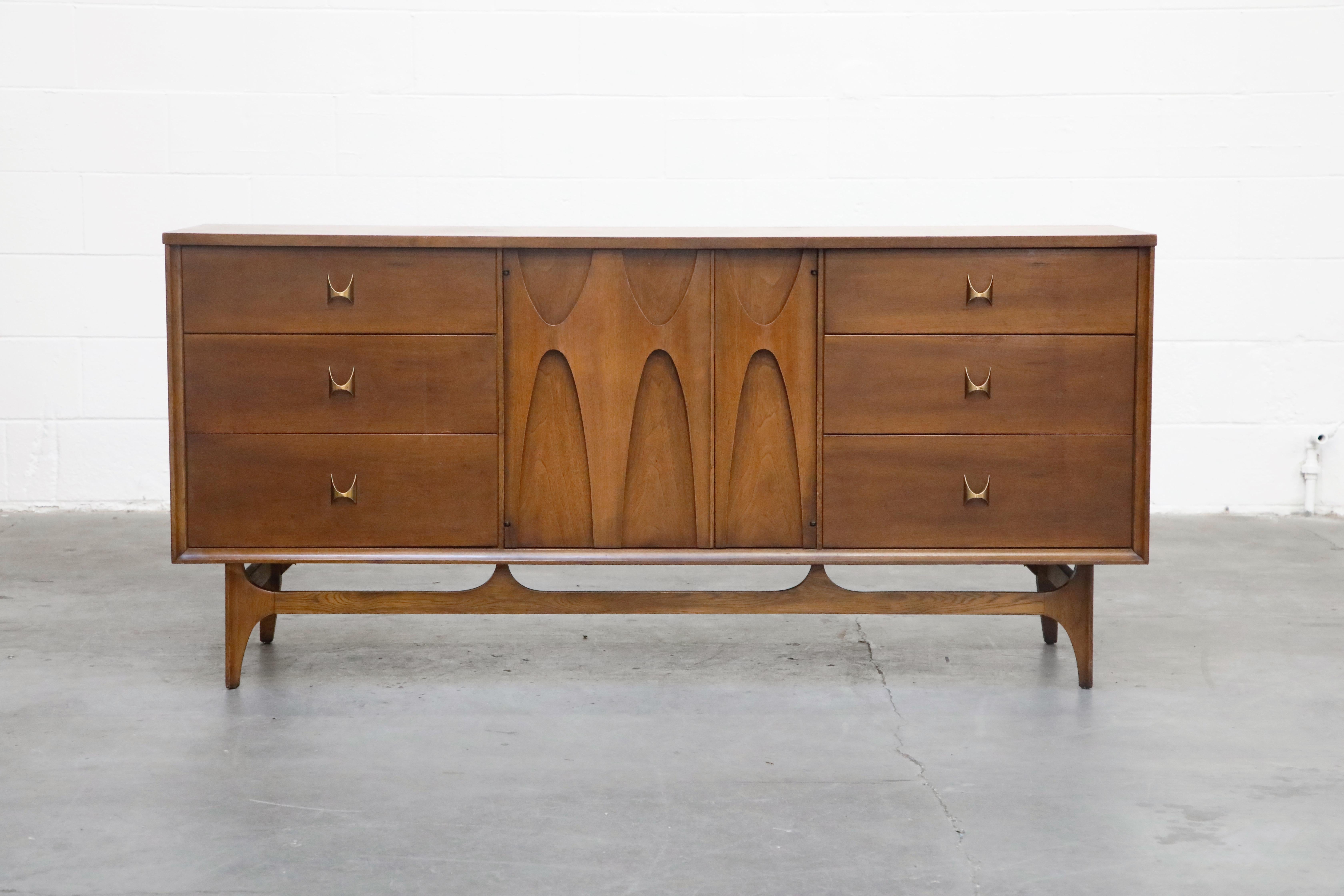 Attention Brasilia collectors... here is a gorgeous 'Brasilia' three-bay dresser in its original finish and in excellent vintage condition and is signed with its original Brasilia label. This beautiful dresser, which also works great as a sideboard