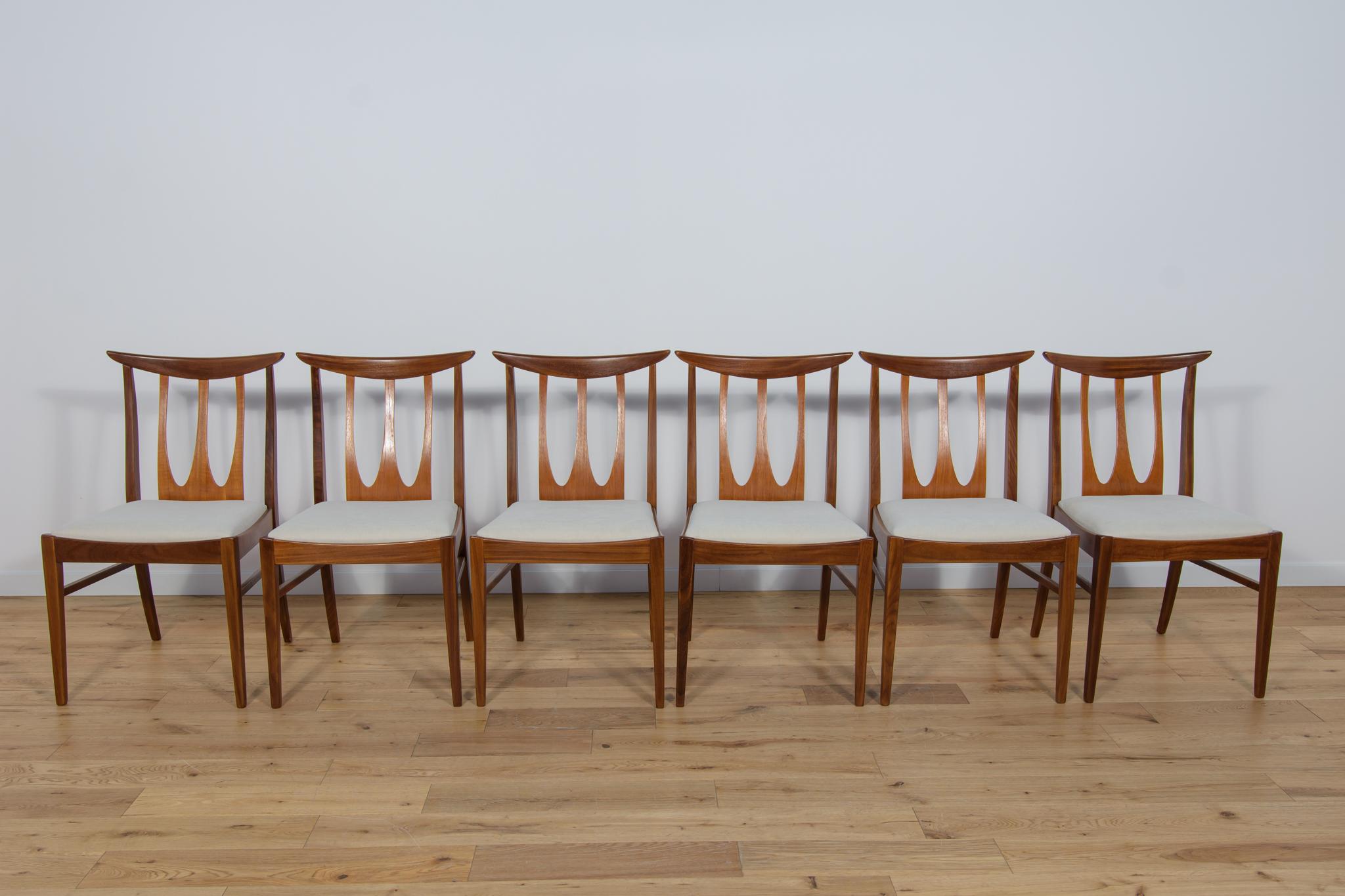 The mid-century dining chairs model Brasilia were manufactured by G-Plan in the UK during the 1960s. Complete restored. The frames are made of teak and the seats have been reupholstered with quality creame . The teak elements have been cleaned from