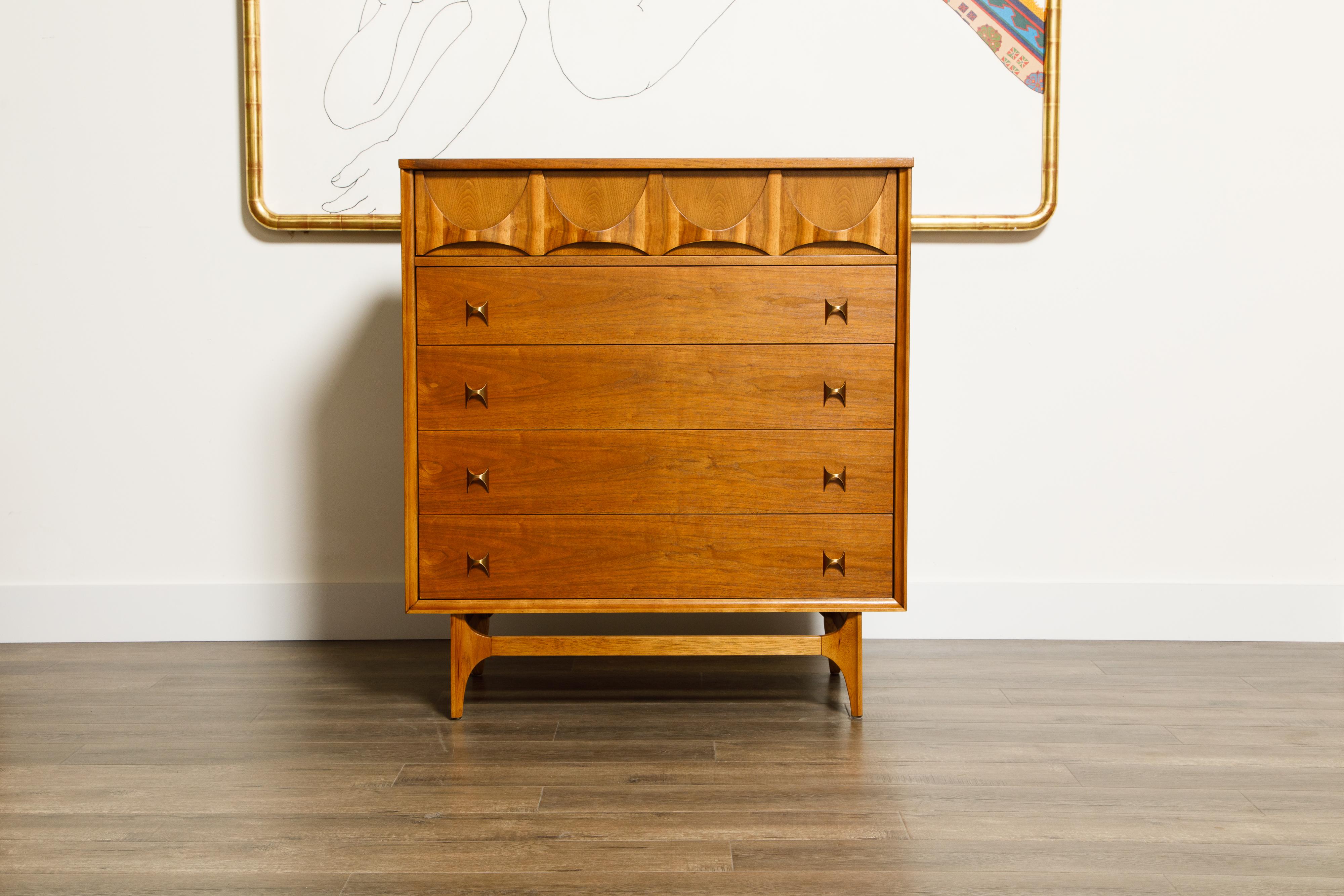 This incredible 'Brasilia' highboy dresser by Broyhill Premiere has been completely refinished and is signed with its original Brasilia label, and ready to grace your home or office. This beautiful high-boy dresser features the signature Brasilia