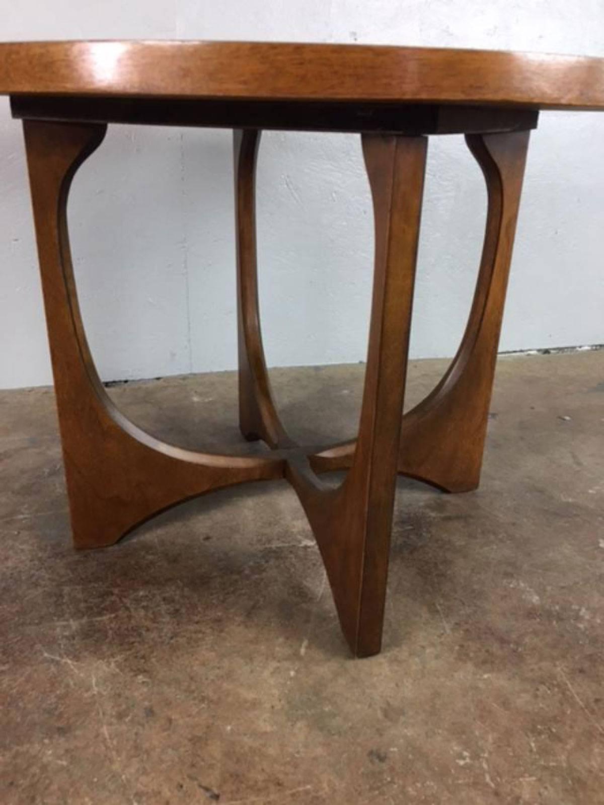 Brasilia side or end table in walnut by Broyhill. Original acquisition condition. Overall very good condition.
