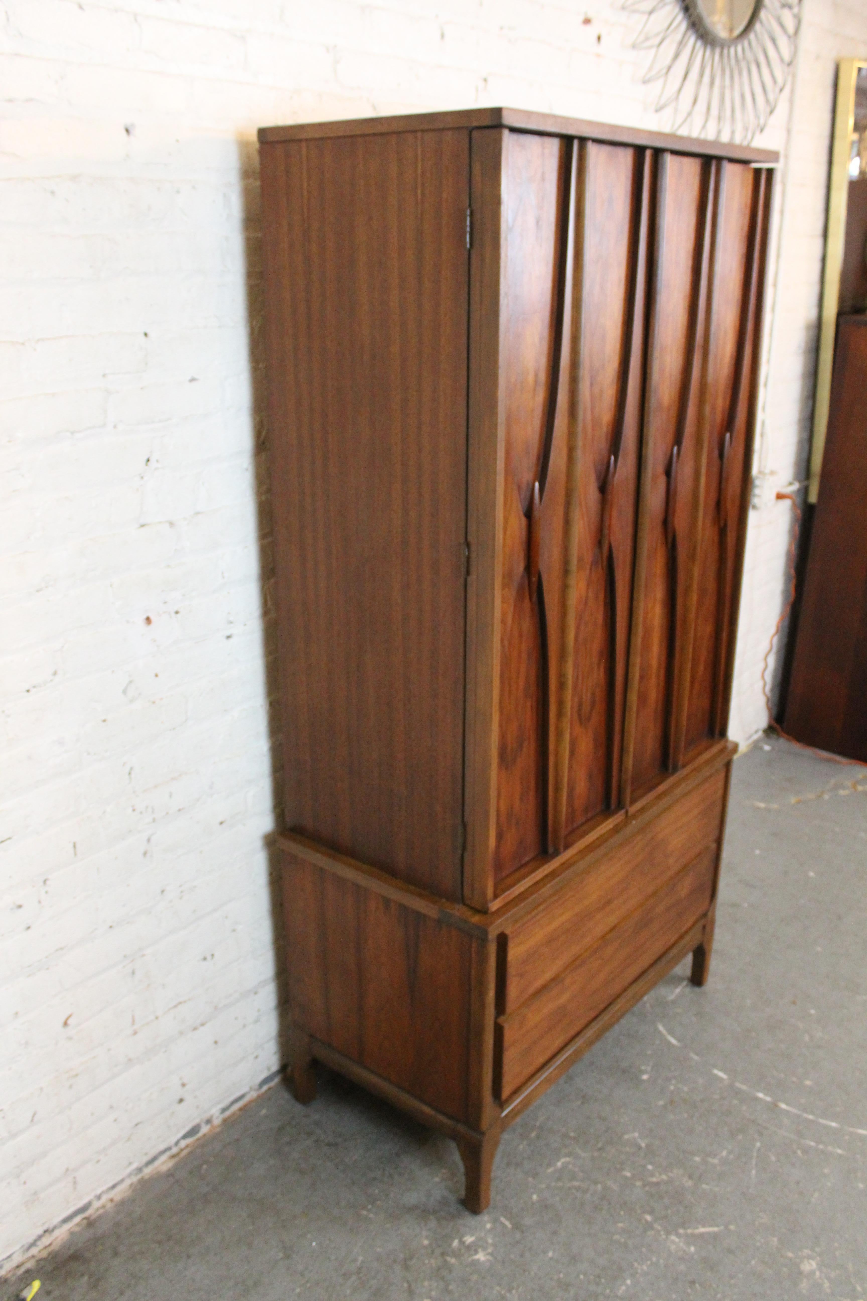 Make a big statement in any space with this impressive vintage 2-piece gentleman's chest built by the skilled craftsman of Sumter, South Carolina's Williams Furniture Corporation. Drawing design inspiration from classic mid-century American
