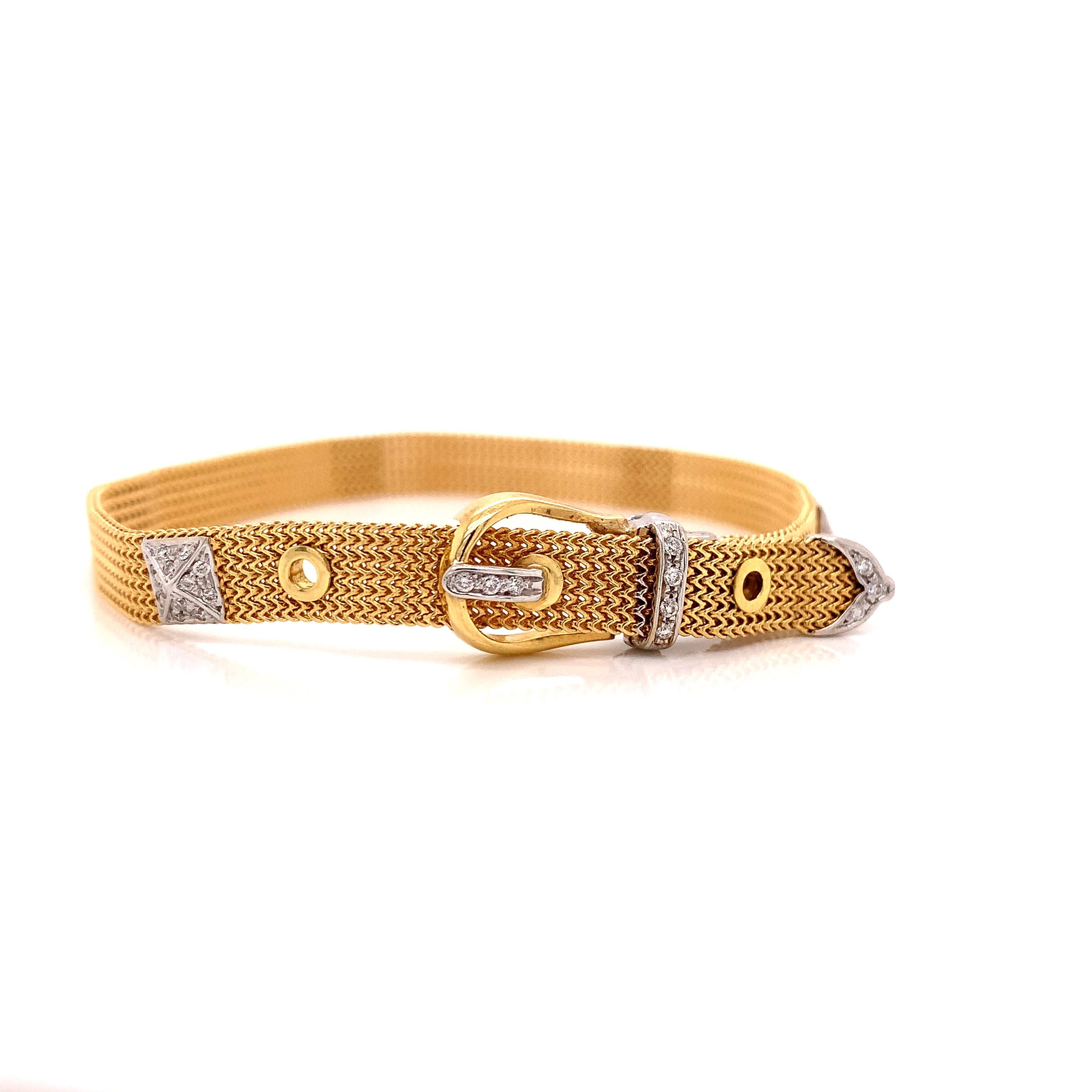 Made by craftsman in Italy, this Brasolin estate diamond buckle bracelet stands alone with its delicate craftsmanship or looks stunning layered.  Also called a Fibbia bracelet, this 18 Kt yellow and white gold bracelet is expertly detailed with .34