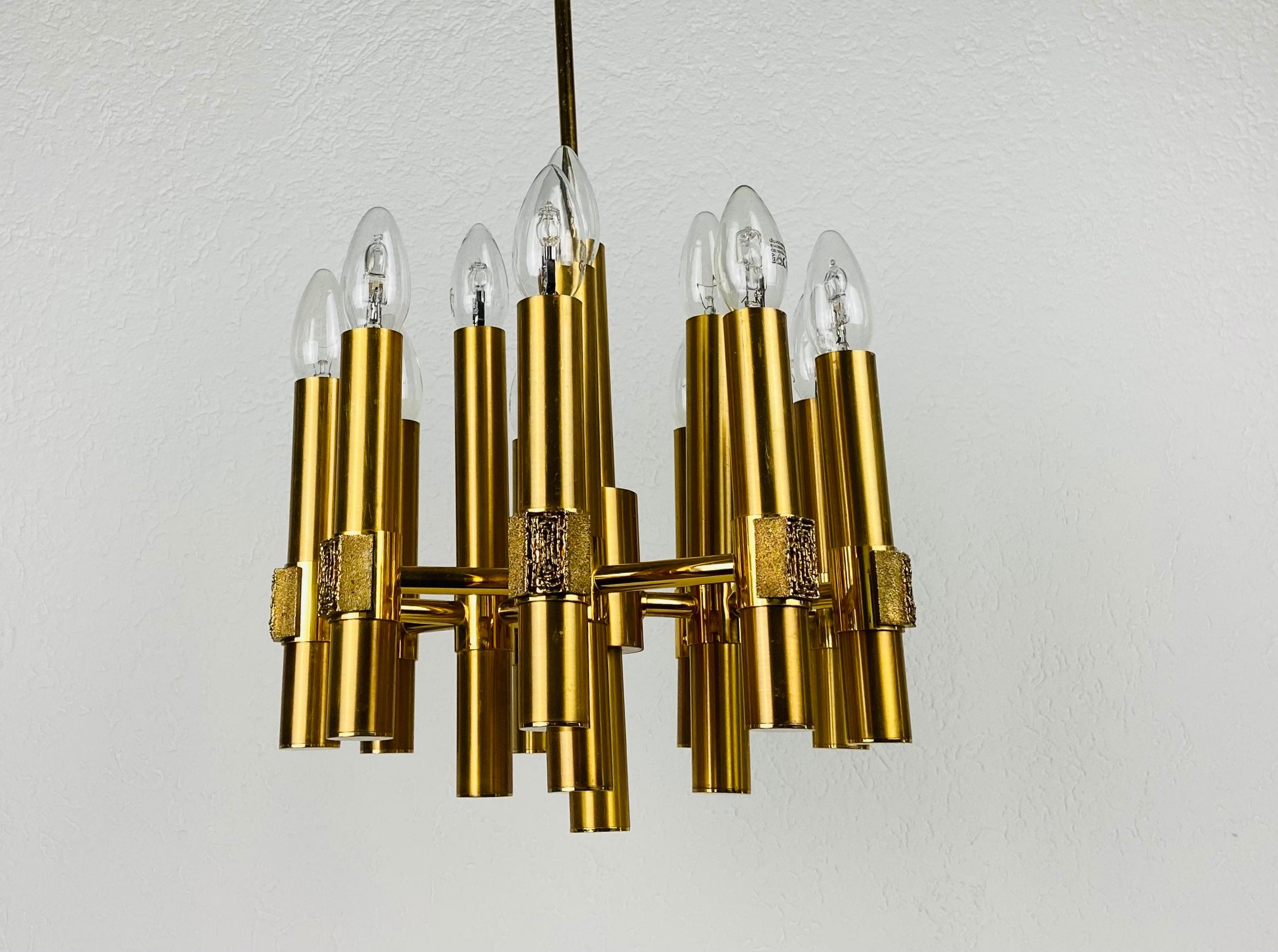 Mid-20th Century Brass 12-Arm Chandelier by Angelo Brotto for Esperiai, Italy, 1960s For Sale