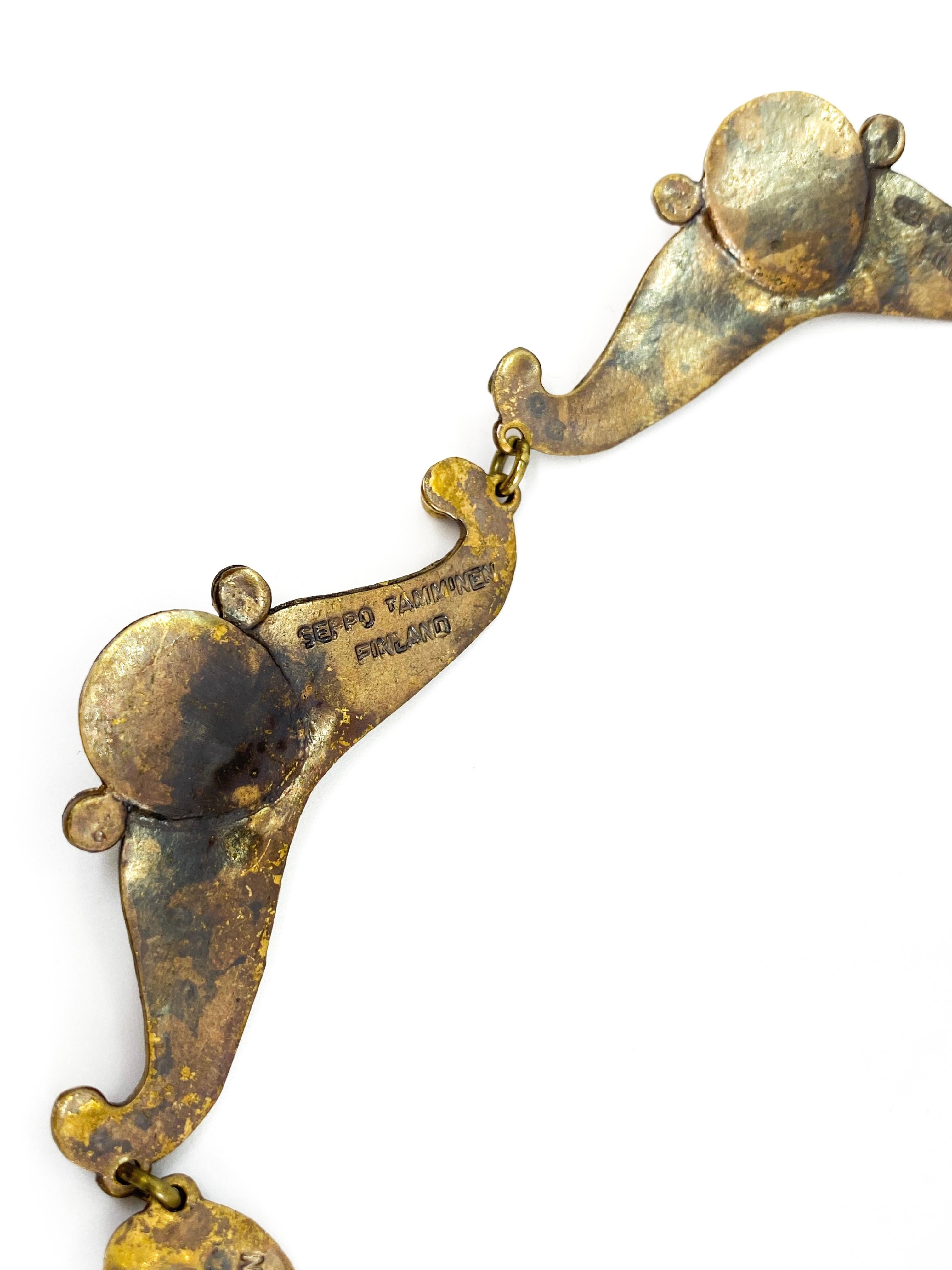 Brass 1970 Finland Seppo Tamminen Necklace 
Similar Seppo Tamminen's jewelery is described in the book
New Design in Jewelry
by Donald J. Willcox
Lenght 54cm (when opened)
1970s
We now sell several Seppo Tamminen jewelery, see also our other