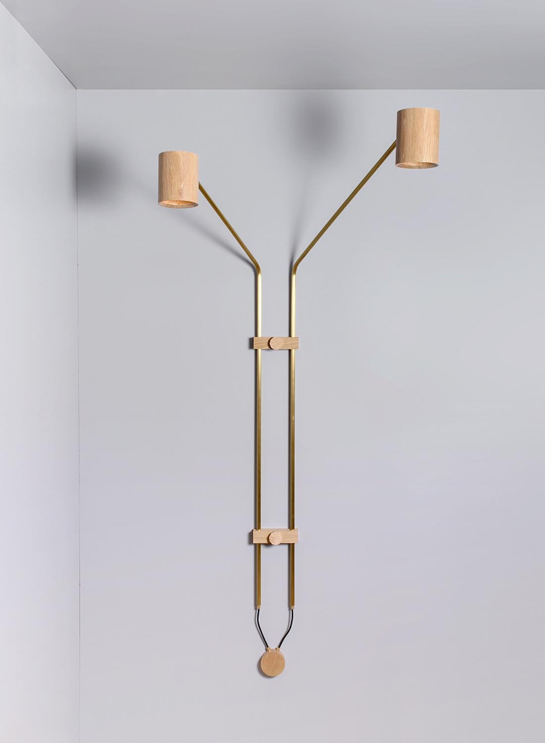 Brass 2 spot wall lamp by ASAF Weinbroom Studio
Dimensions: 181 x 80 x 17 cm
Materials: Brass + Wood

Canopy: Oak
Wattage / Type socket: 15w Max Led / E27
ASAF WEINBROOM studio was established in 2009.

All our lamps can be wired according