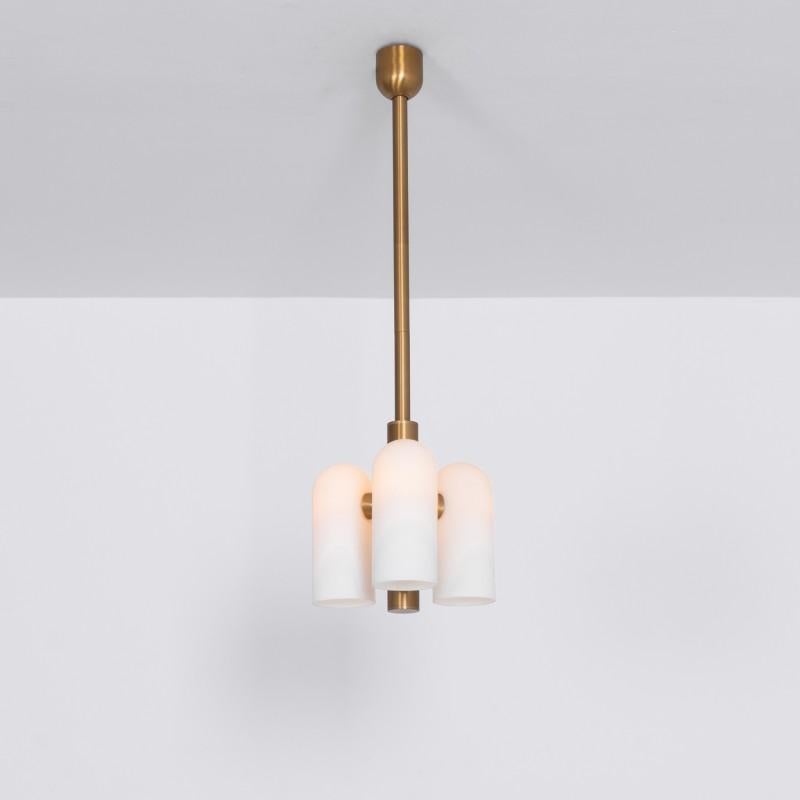 Odyssey 3 Brass Pendant Light by Schwung
Dimensions: W 28.6 x D 28.6 x H 137 cm
Materials: Brass, frosted glass

Finishes available: Black gunmetal, polished nickel
4 other sizes available

Schwung is a German word, and loosely defined, means energy