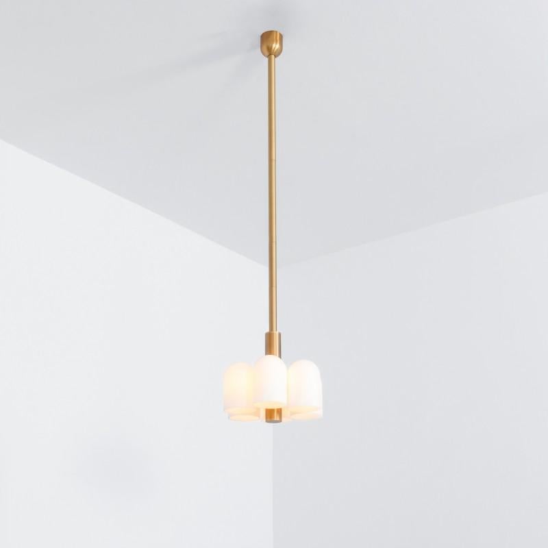 Odyssey 6 Brass Pendant Light by Schwung
Dimensions: W 31.4 x D 31.4 x H 134 cm
Materials: Brass, frosted glass

Finishes available: Black gunmetal, polished nickel

Schwung is a German word, and loosely defined, means energy or momentumm of a