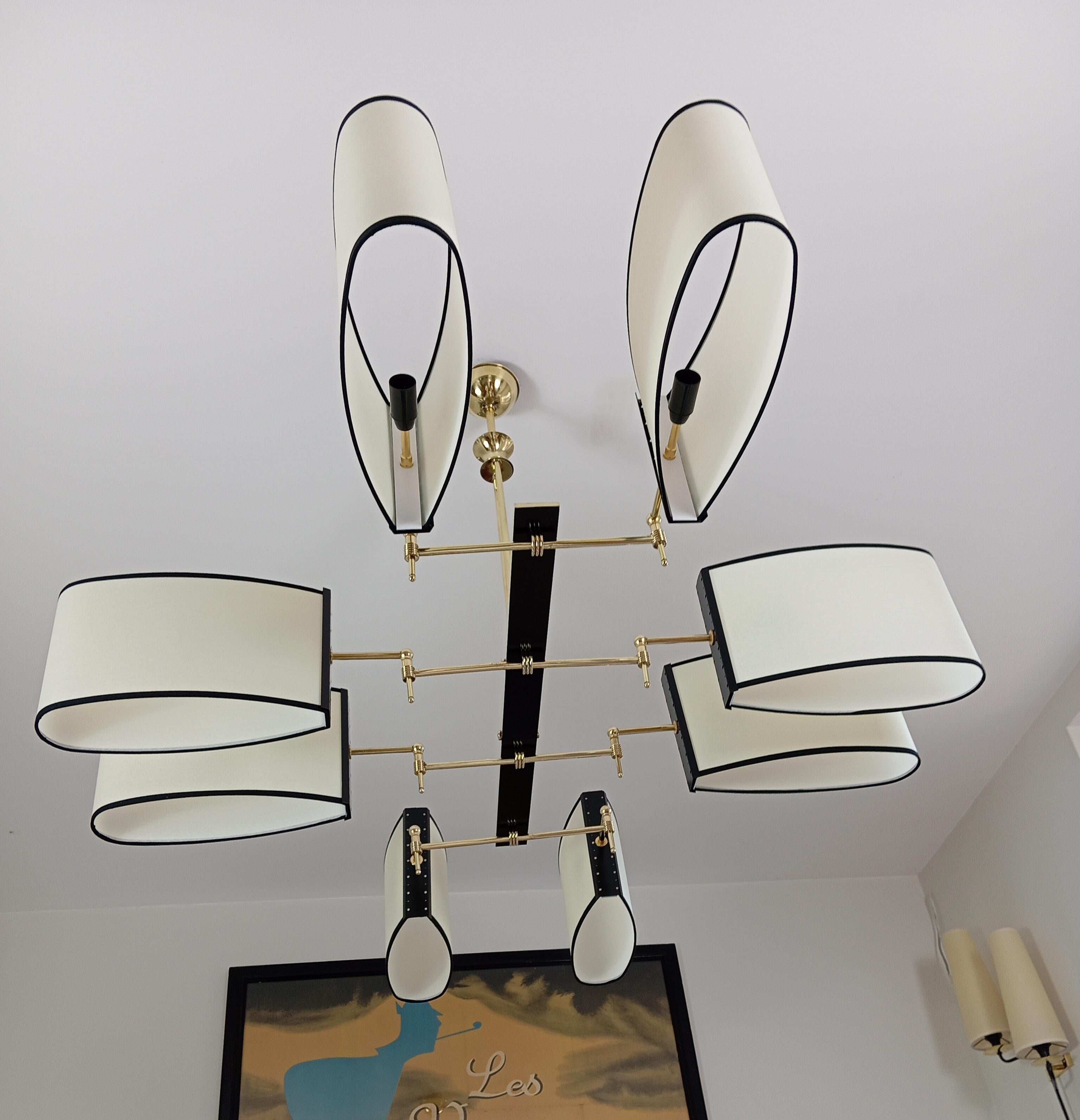 20th Century Brass 8-light chandelier, Maison Lunel circa 1950