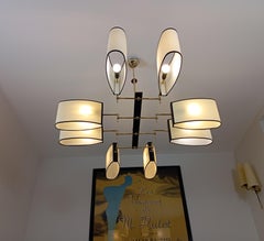 Brass 8-light chandelier, R Lunel circa 1950