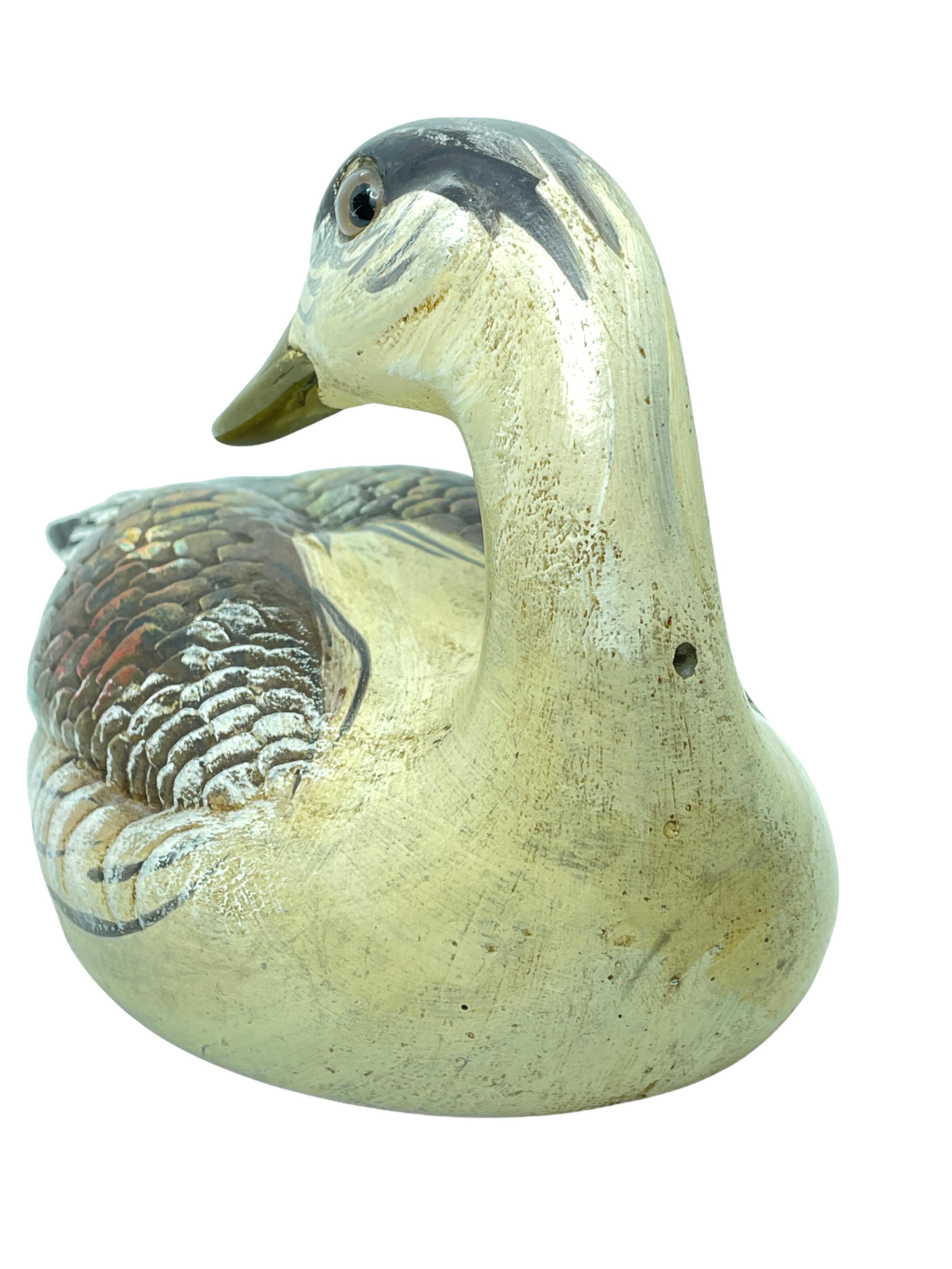 brass duck figurine