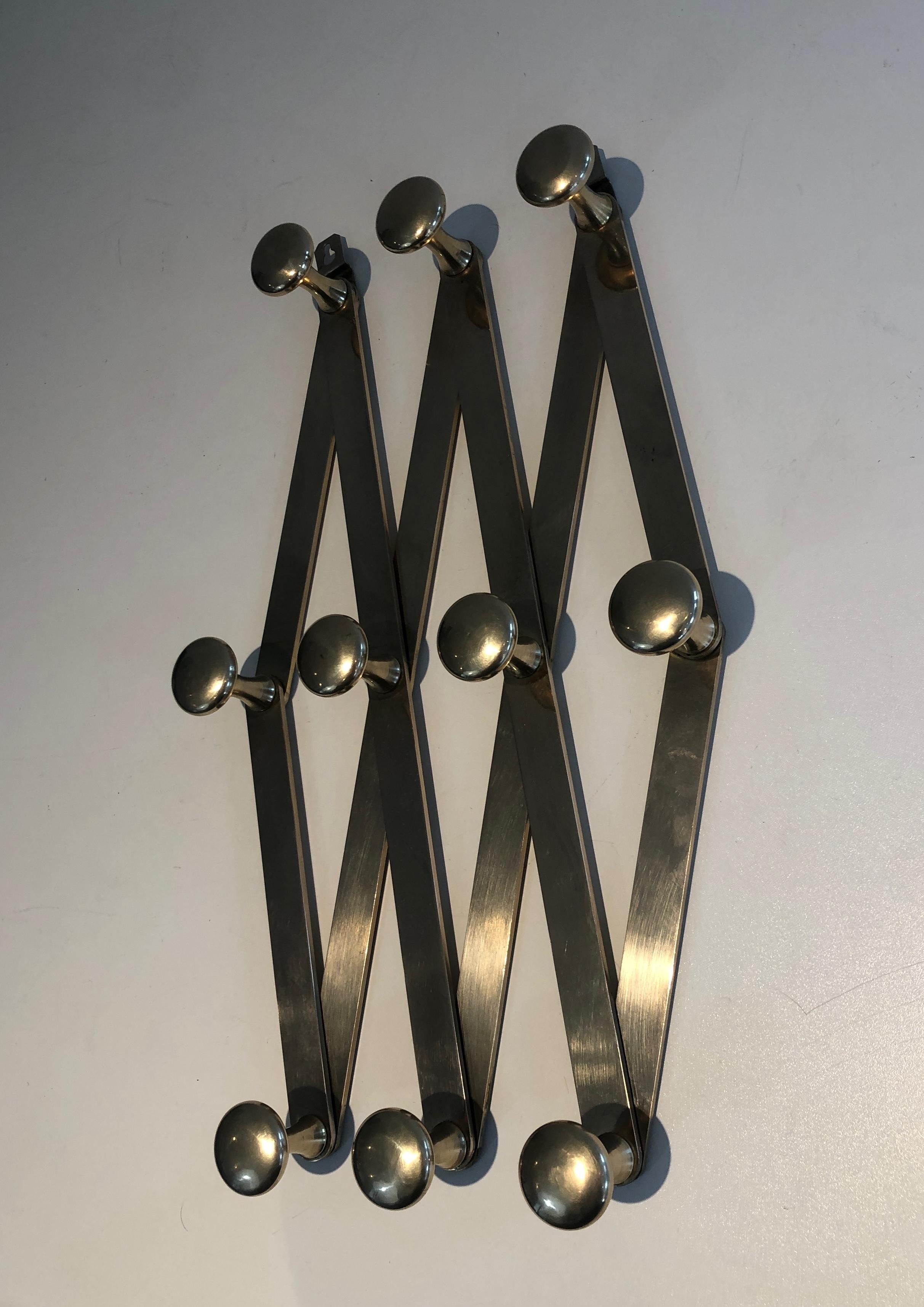 Ottone Appendiabiti da parete a fisarmonica in ottone. Lavoro francese. Circa 1970 in vendita