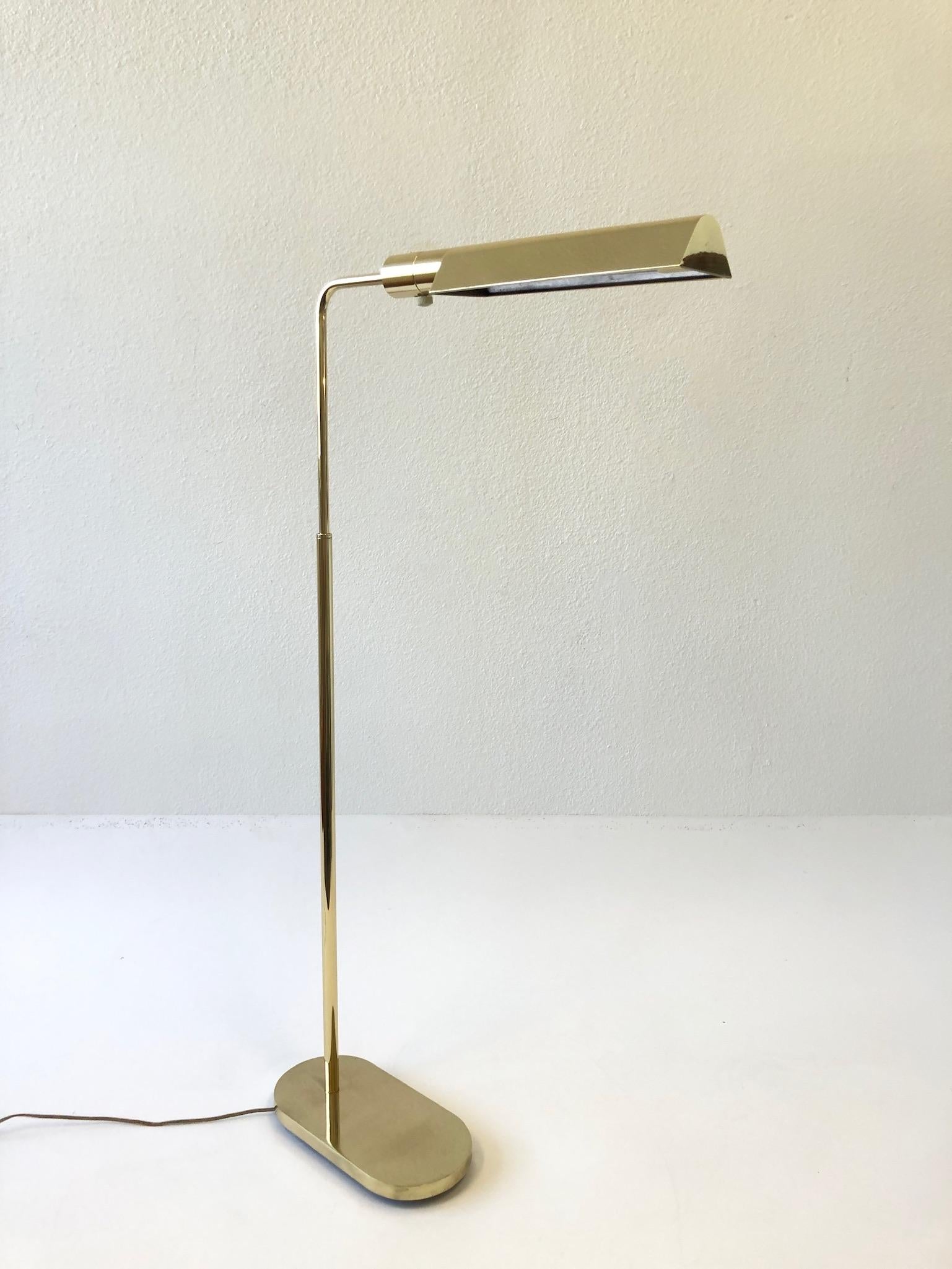1970’s polish brass adjustable floor lamp by Casella Lighting.
When all the way up the high is 48”, when all the way down the high is 33”, it can rotated 360*.
The base is 12” wide 6” deep.
Full range dimmer, 75w max bulb.
Overall dimensions: