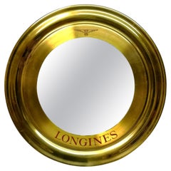 Specchio pubblicitario in ottone Longines, anni '70