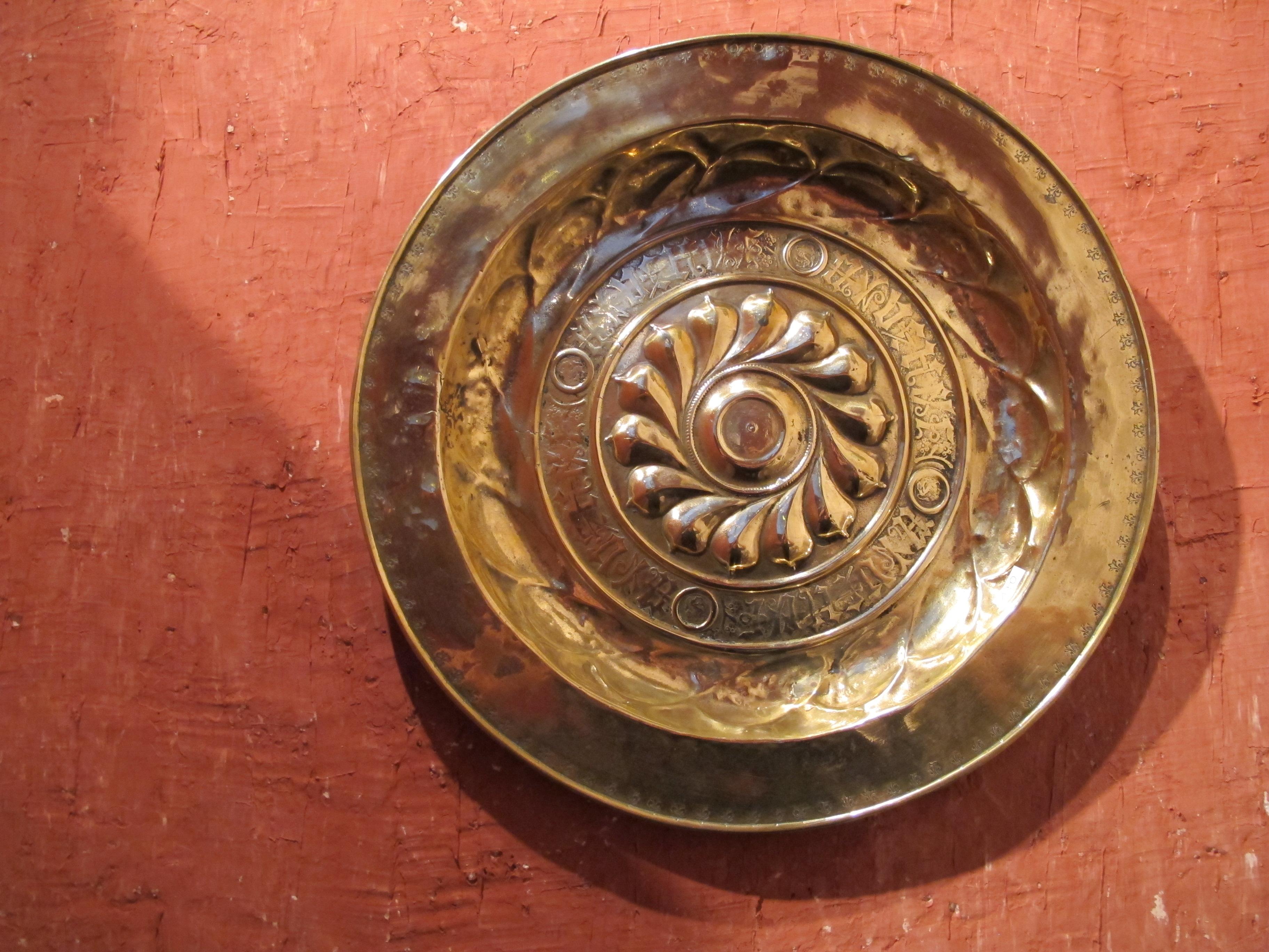 Origin: South of Germany, Nuremberg
Period: Late 15th century

Diameter : 41 cm

Embossed brass

This is in Belgium, in the city of Dinant during the 12th and 13th centuries, that the ‘copper beaters’ corporation transfers the name of the