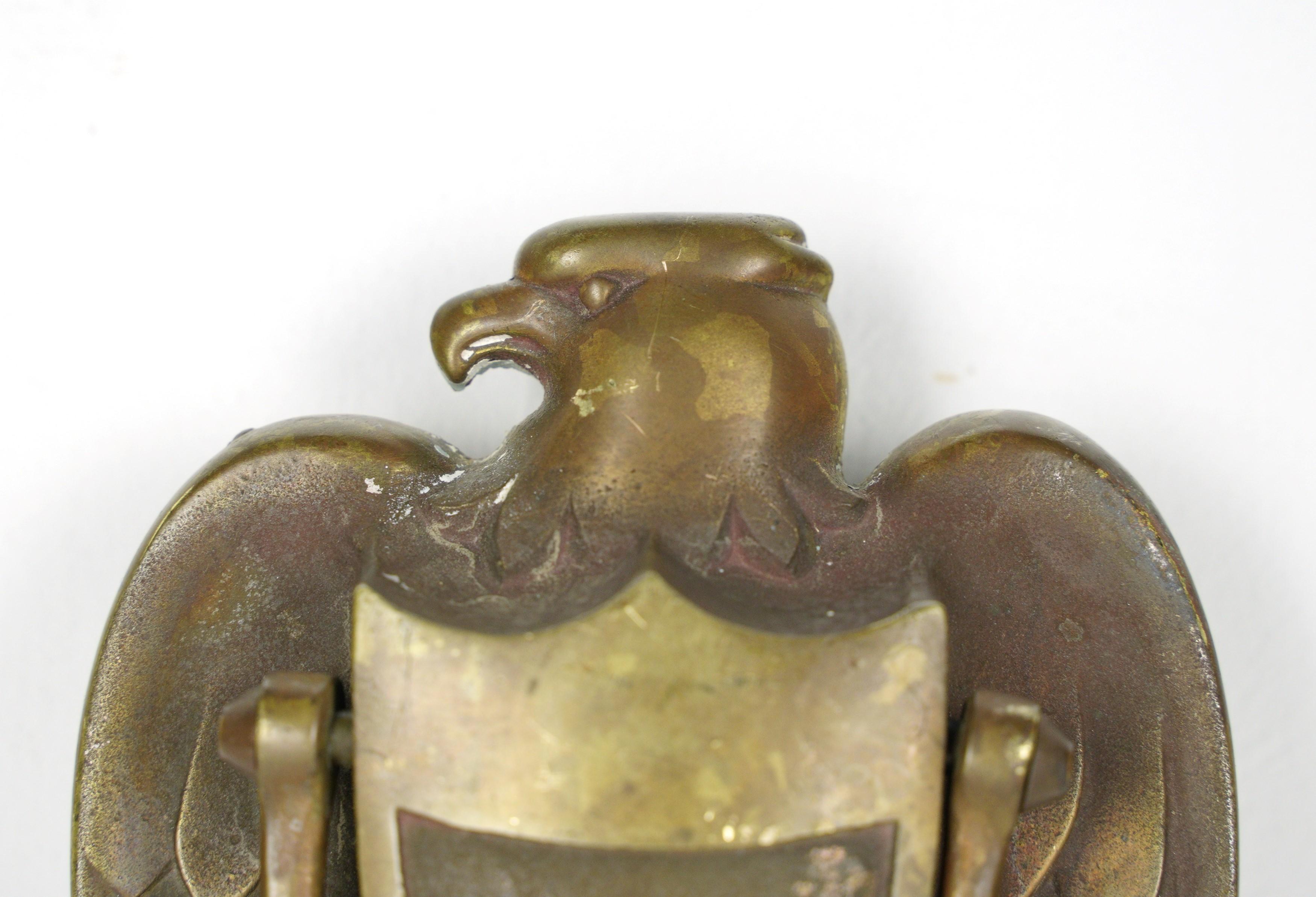 This door knocker features a majestic eagle motif in brass, adding a touch of regal charm to your front door. Whether you're looking to make a statement or embrace a patriotic theme, this vintage door knocker combines both functionality and classic
