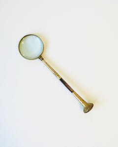 Loupe en laiton et coquillage d'ormeau