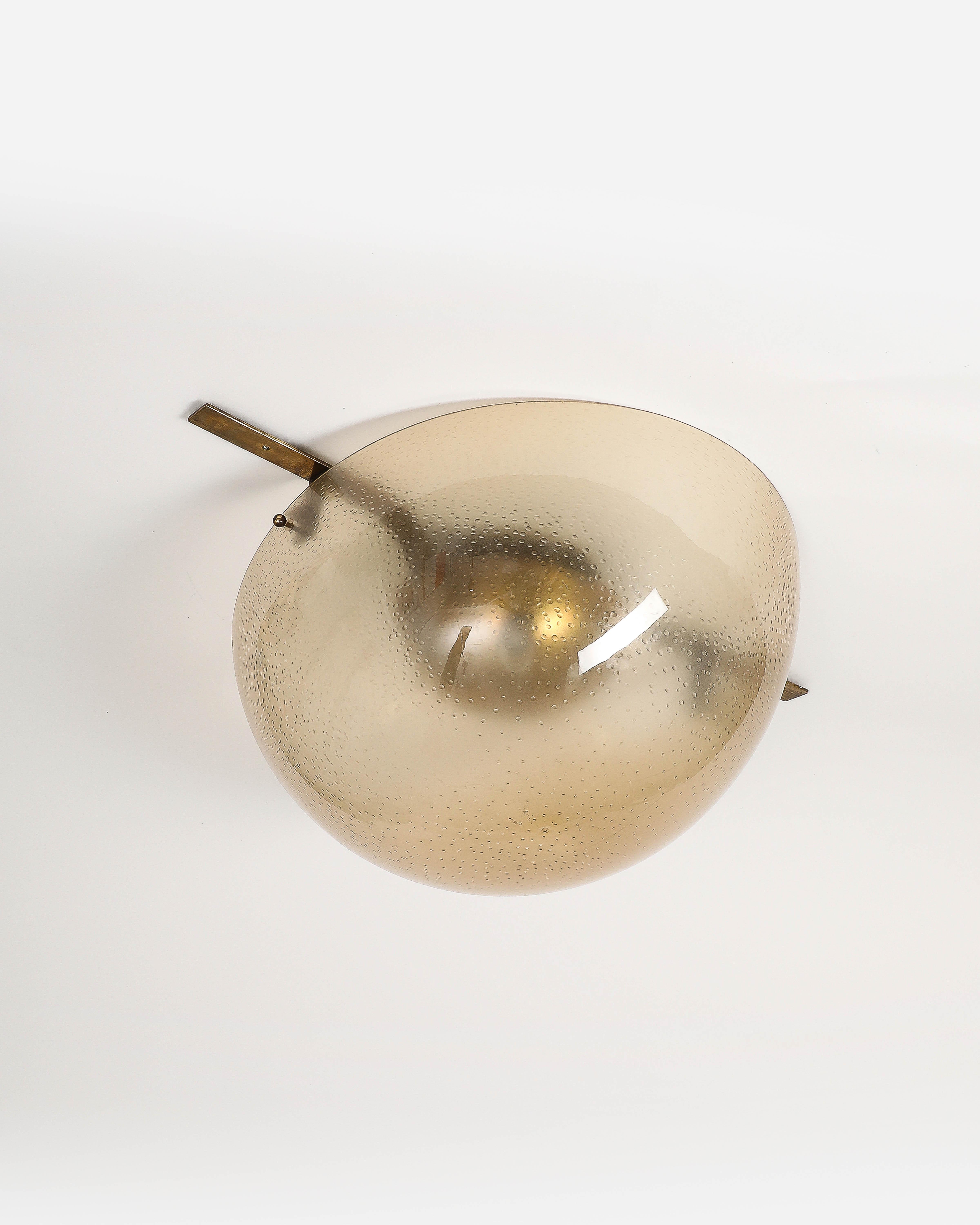 Ceiling lamp with textured acrylic cover.