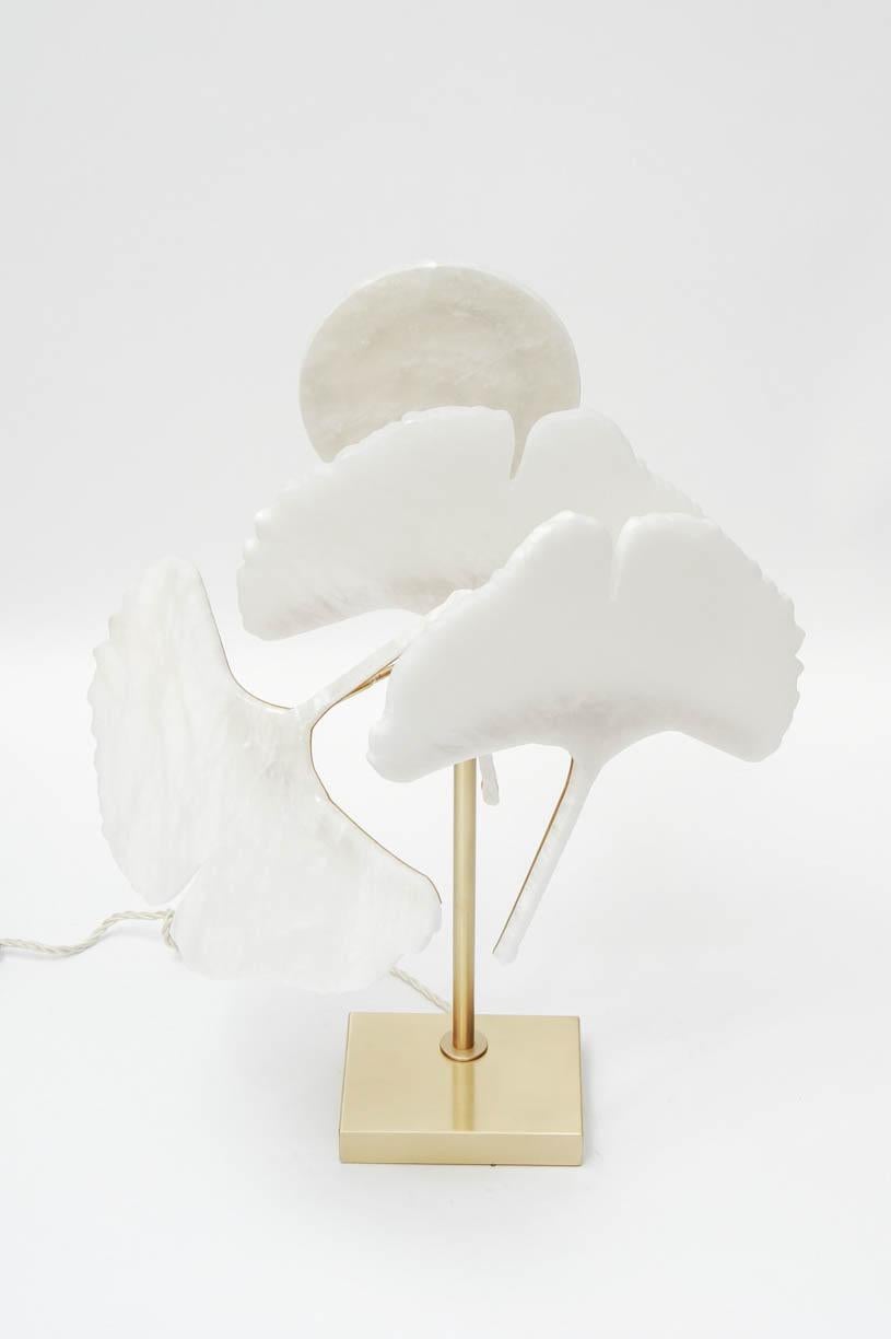 Original design by glustin luminaires, brass table lamp with three Gingko leaves made of alabaster.