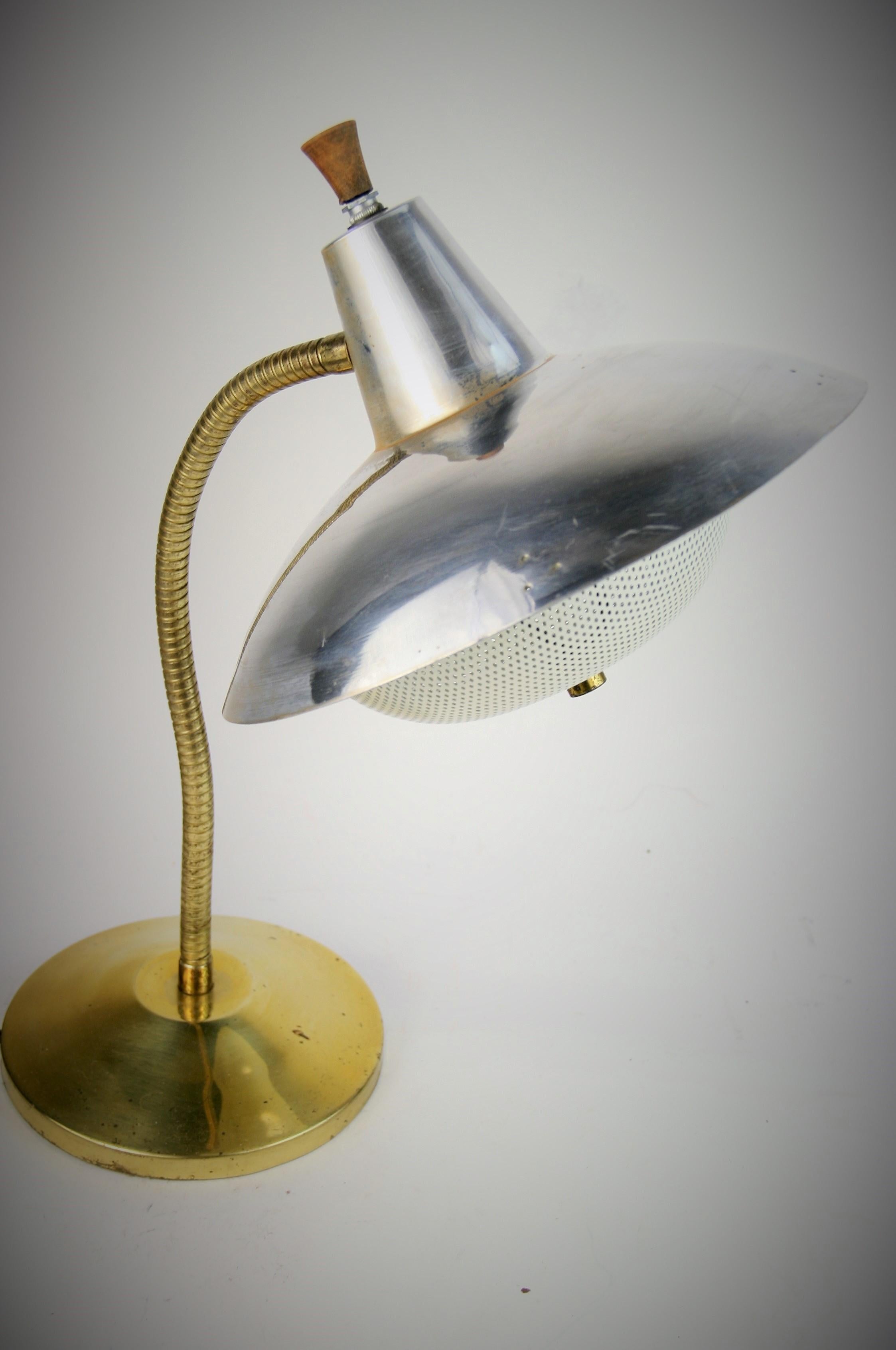 2-328 brass and aluminum adjustable table/desk lamp with perforated baffle
Original wiring in working order.